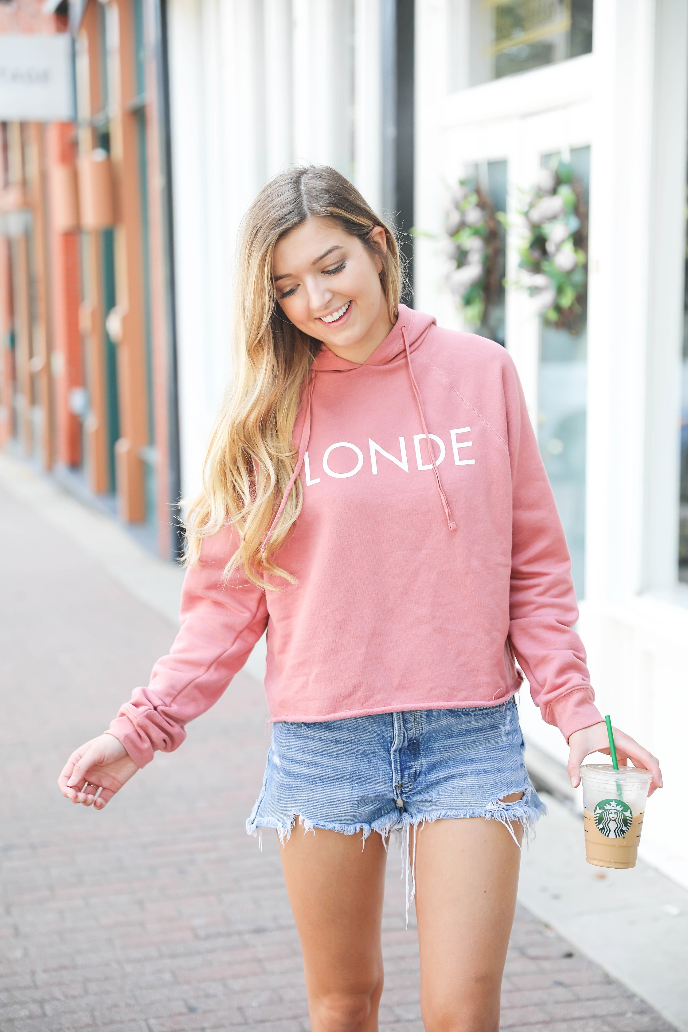 Blonde sweatshirt! I love this cute coral sweatshirt that says "Blonde." It also comes in brunette and red head plus the sweatshirt comes in black and lavender! Such a fun summer style outfit! Details on fashion blog daily dose of charm by lauren lindmark