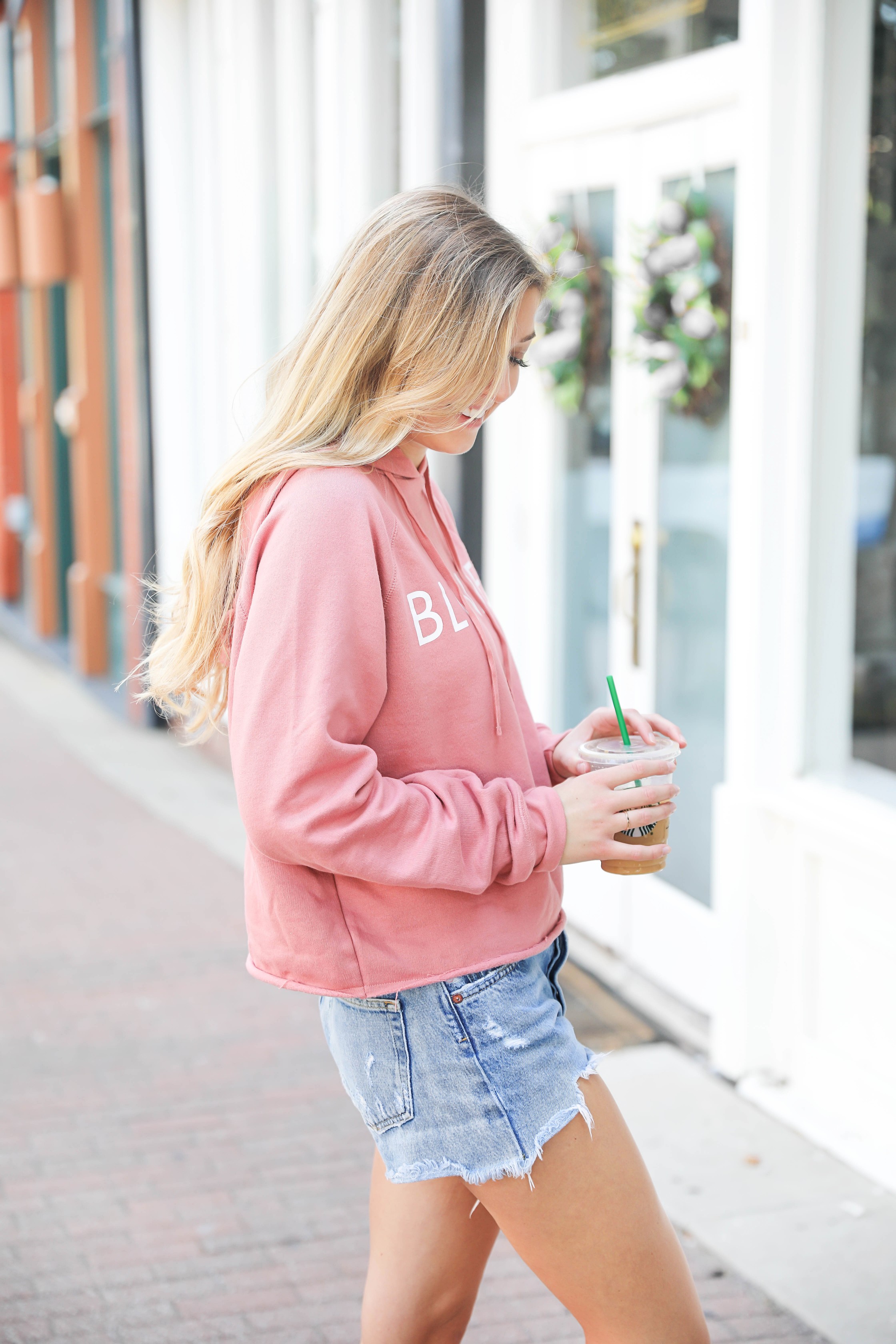 Blonde sweatshirt! I love this cute coral sweatshirt that says "Blonde." It also comes in brunette and red head plus the sweatshirt comes in black and lavender! Such a fun summer style outfit! Details on fashion blog daily dose of charm by lauren lindmark