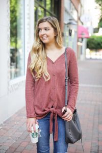 Burgundy waffle top! These waffle tops are all the rage, I love when they are tied on the end! It comes in a ton of cute fall colors. I paired mine with ripped denim jeans and this cute Rebecca Minkoff purse! Such a cute fall outfit for back to school! Details on fashion blog daily dose of charm by lauren lindmark