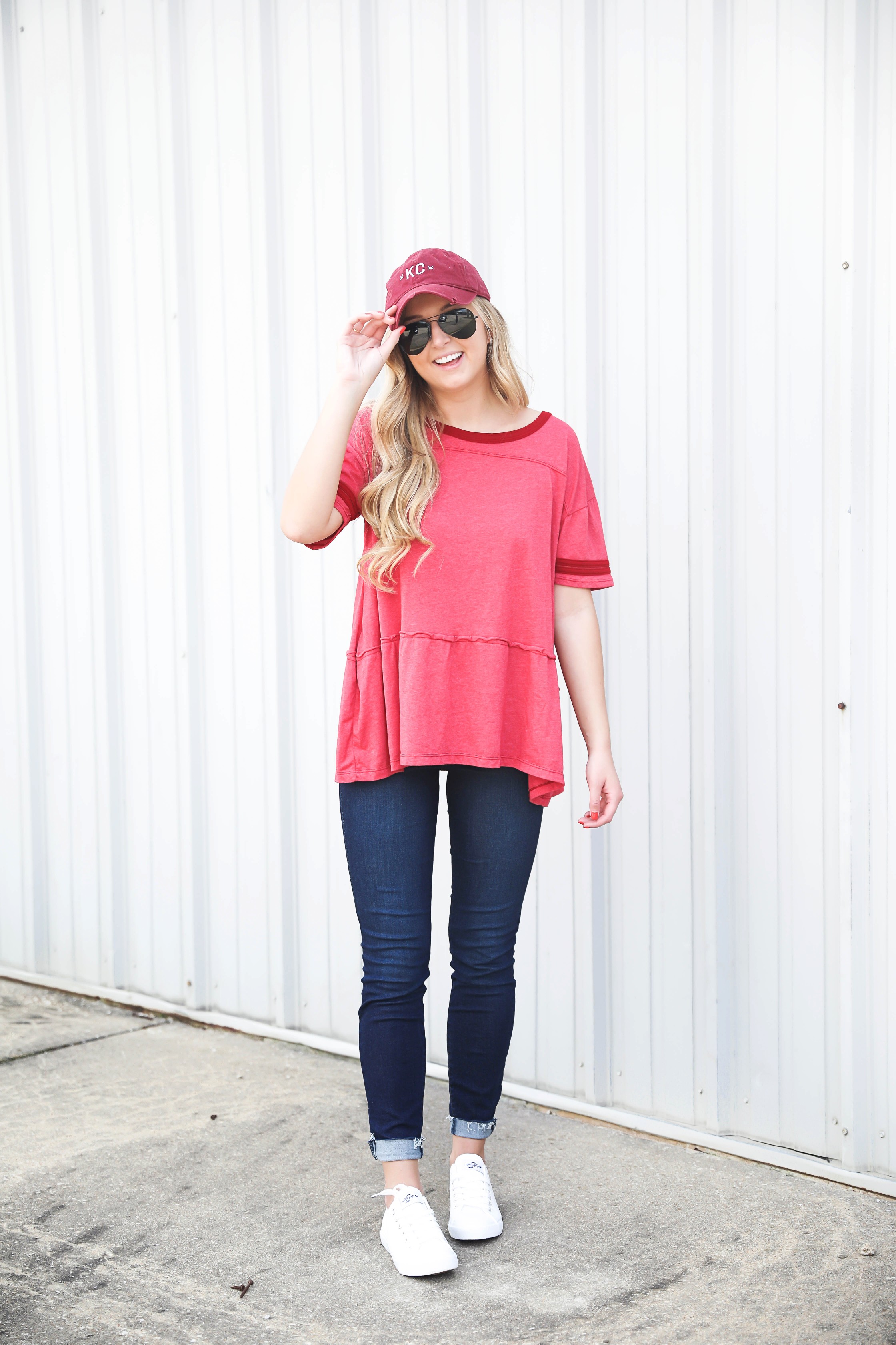 Kansas City outfit ideas! Cute KC top, this casual red top is perfect for chiefs games this fall! I am also sharing this cute outfit for Royals Games! This sequin KC royals shirt is so cute! Details on fashion blog daily dose of charm by lauren lindmark