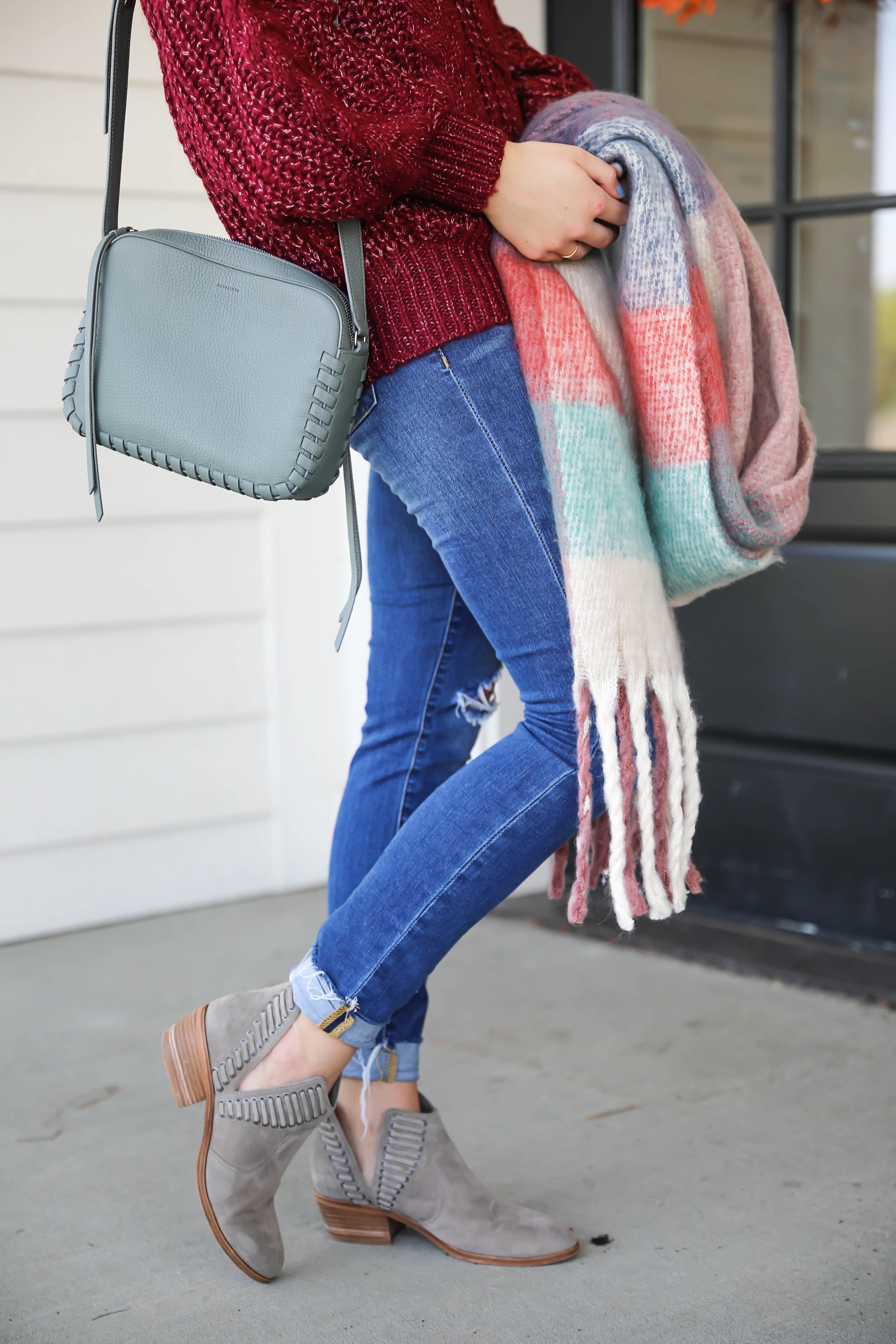 Burgundy knit sweater with the softest plaid oversized scarf! Paired with ripped denim jeans and my vince camuto booties! This is the perfect fall outfit you need in your closet! A few pieces are from Red Dress Boutique which is the best online store, especially for fall clothes! Details on fashion blog daily dose of charm by lauren lindmark