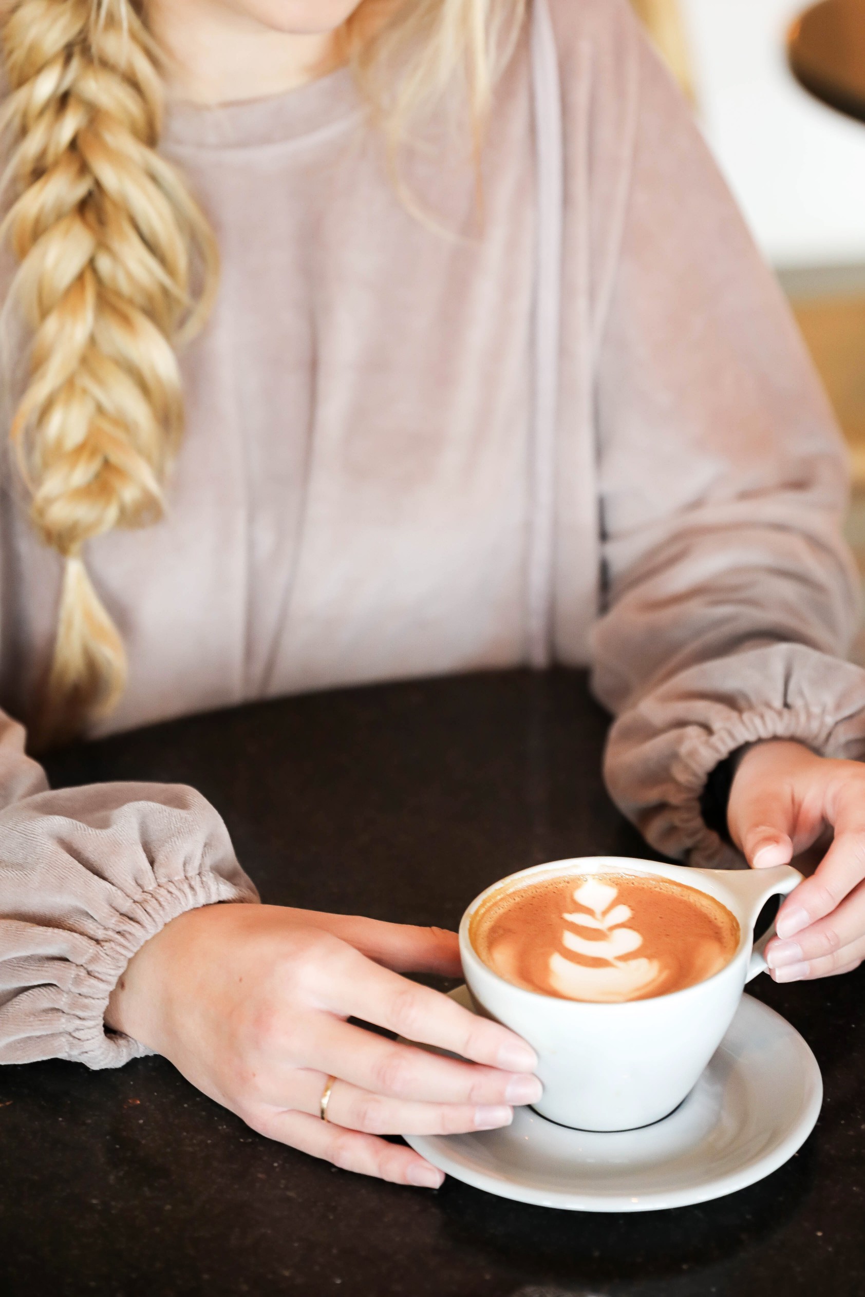 How I boosted my Instagram Engagement by 50%! My tips and tricks for growing an authentic following on Instagram and boosting your likes! Coffee shop date photoshoot! I love this herringbone fall phone case with my Sole Society faux leather bag! I love this velvet sweatshirt with my fishtail braid! Details on fashion blog daily dose of charm by lauren lindmark