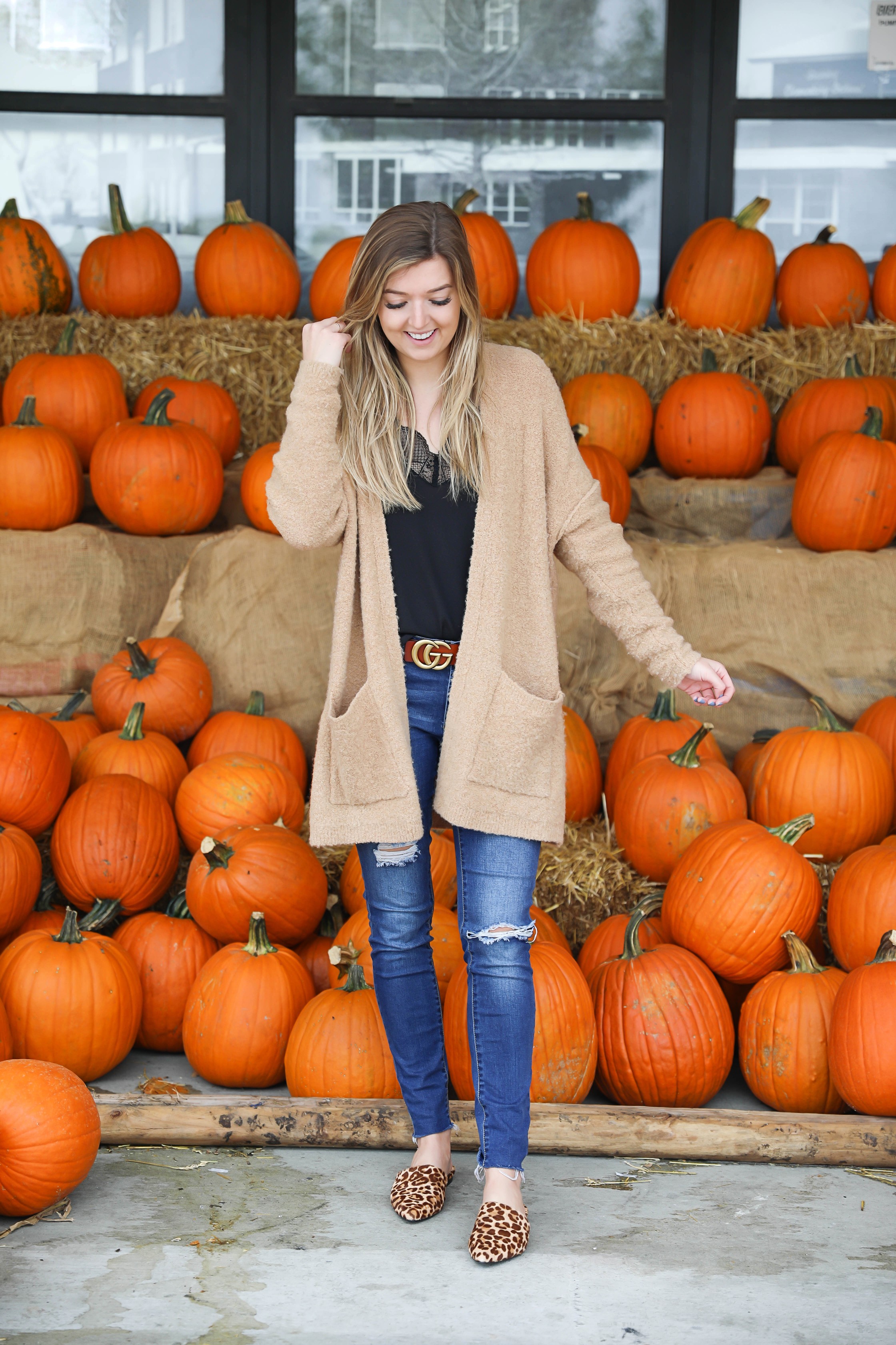 Fall outfit for the pumpkin patch! The cutest brown gucci belt and free people cardigan paired with a lace cami and leopard flats! Details on fashion blog daily dose of charm by lauren lindmark