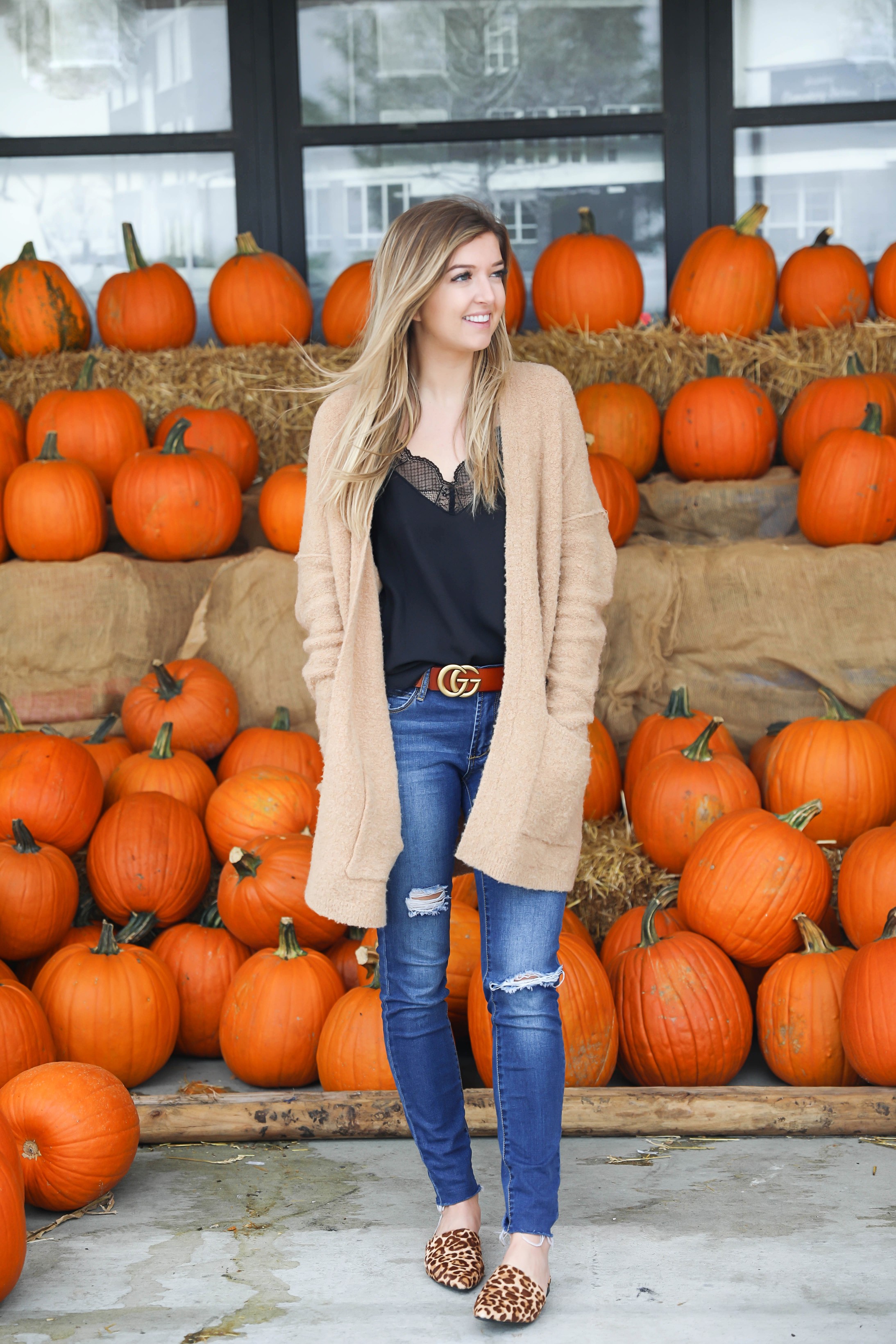 Fall outfit for the pumpkin patch! The cutest brown gucci belt and free people cardigan paired with a lace cami and leopard flats! Details on fashion blog daily dose of charm by lauren lindmark