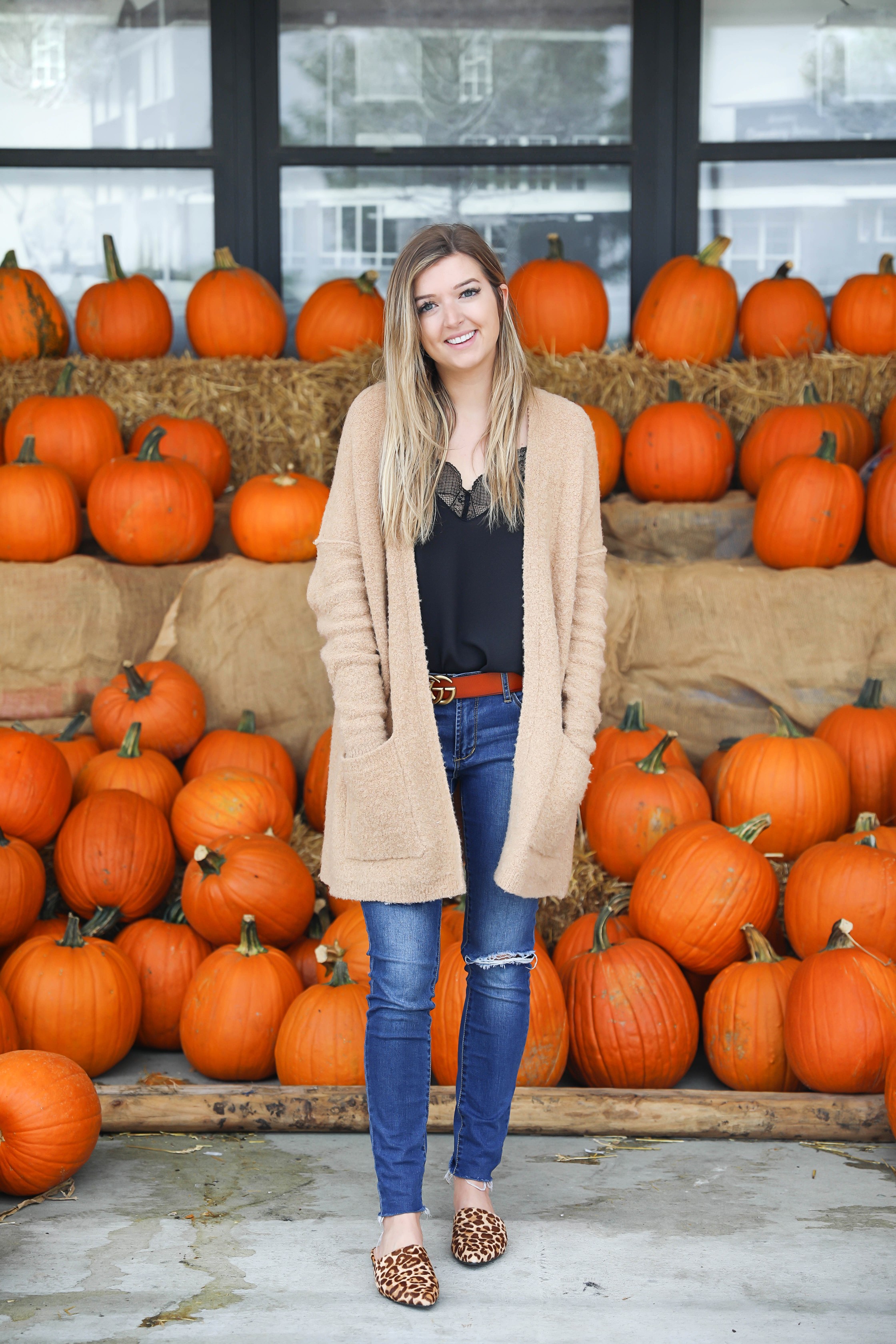 Fall outfit for the pumpkin patch! The cutest brown gucci belt and free people cardigan paired with a lace cami and leopard flats! Details on fashion blog daily dose of charm by lauren lindmark