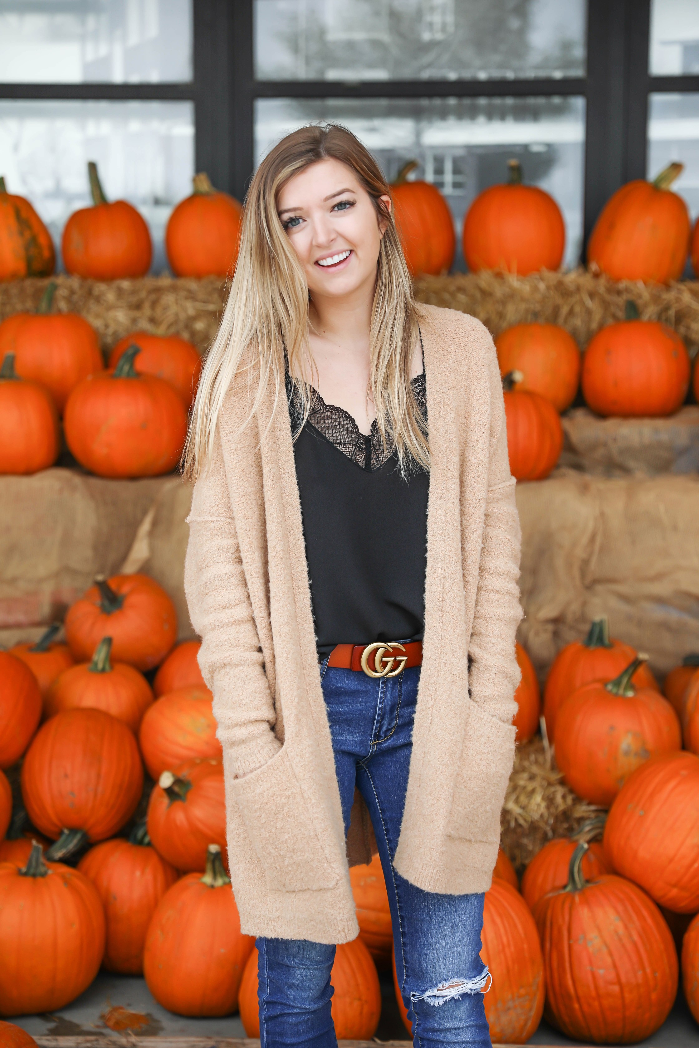 Fall outfit for the pumpkin patch! The cutest brown gucci belt and free people cardigan paired with a lace cami and leopard flats! Details on fashion blog daily dose of charm by lauren lindmark