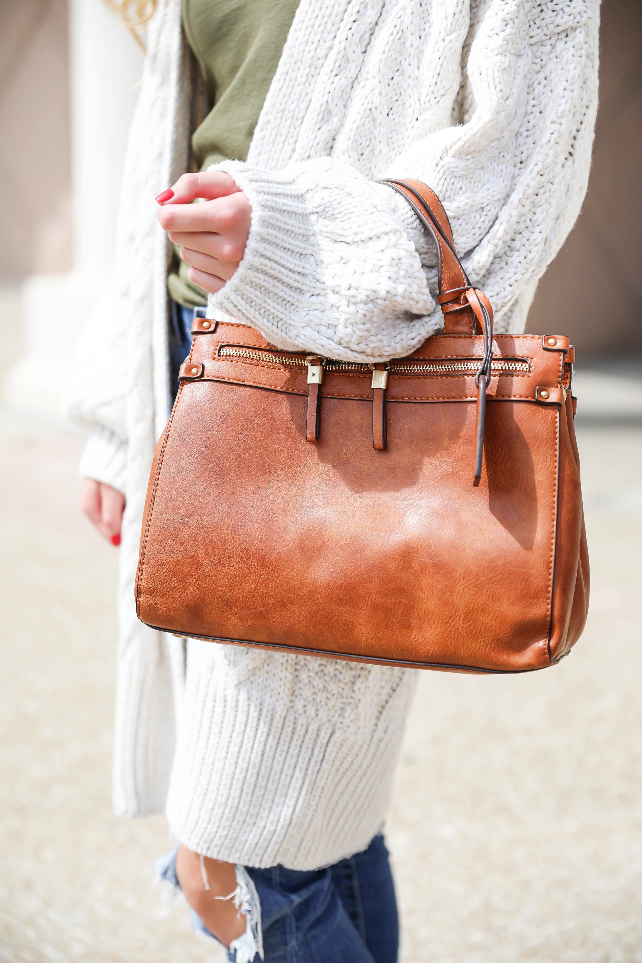 Long cream knit cardigan with a fun olive tank! Paired with my favorite ripped jeans and this super cute faux leather sole society bag that's perfect for fall! These are also the best booties for fall! Details on fashion blog daily dose of charm by Lauren Lindmark