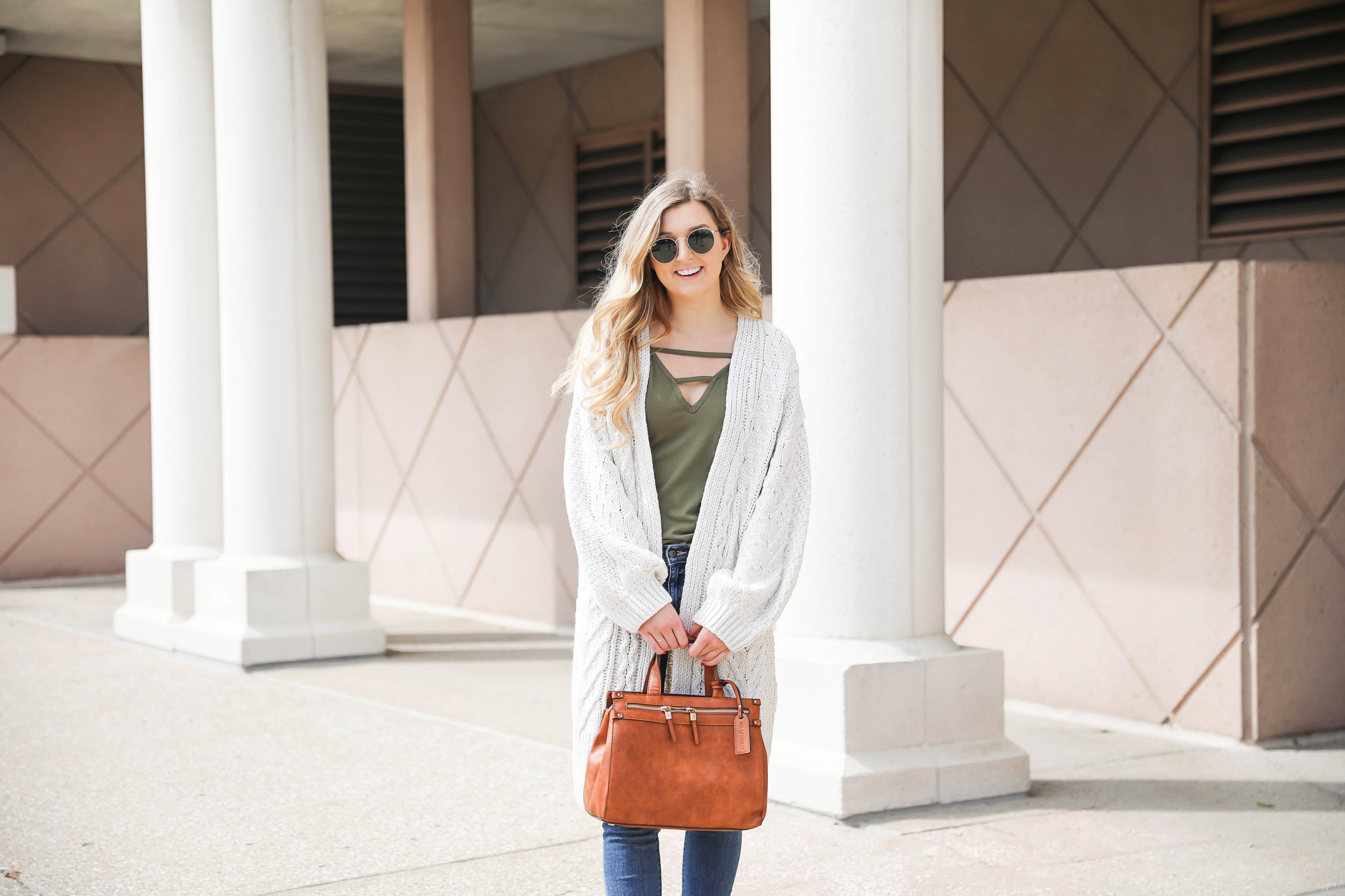 Long cream knit cardigan with a fun olive tank! Paired with my favorite ripped jeans and this super cute faux leather sole society bag that's perfect for fall! These are also the best booties for fall! Details on fashion blog daily dose of charm by Lauren Lindmark