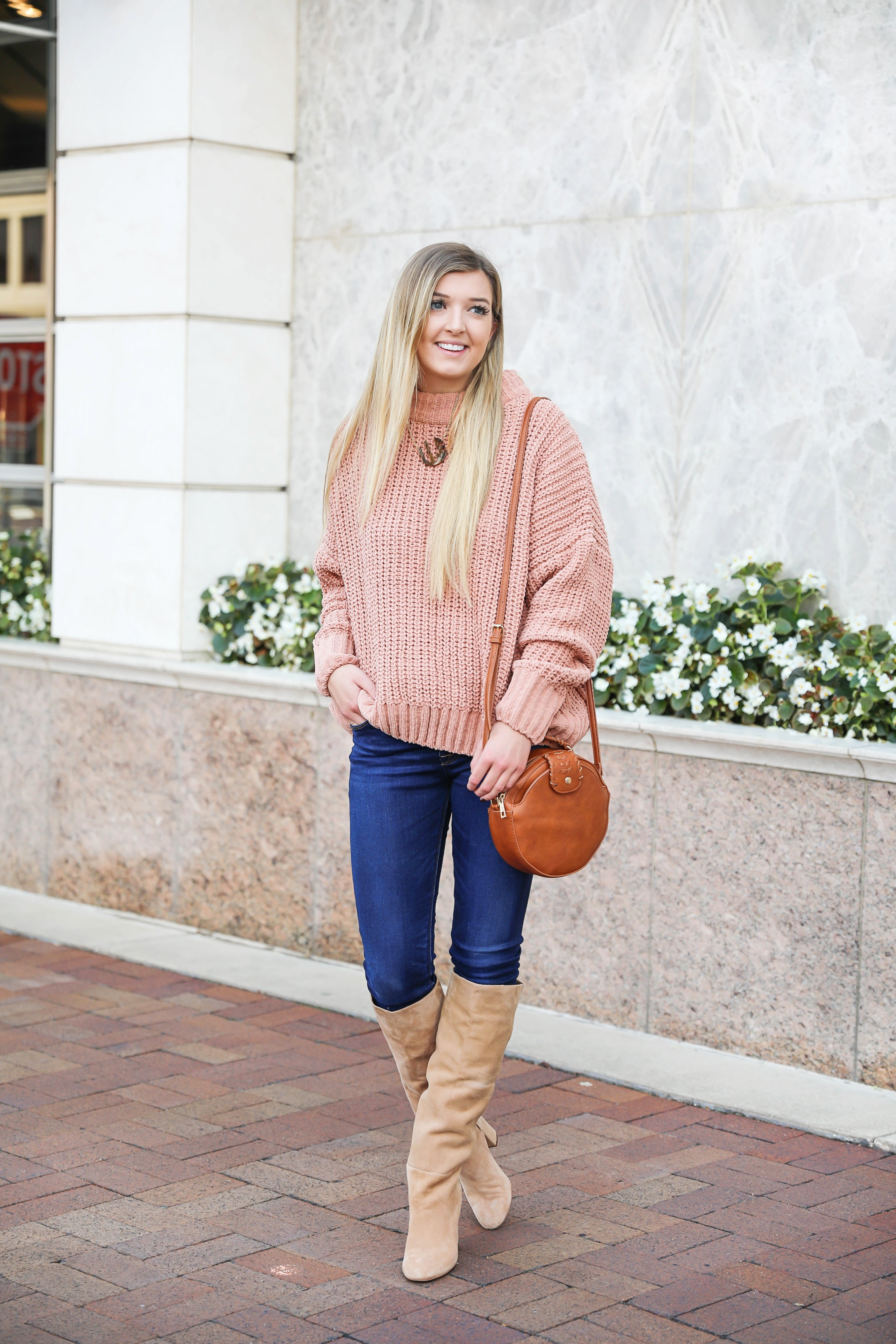 Oversized soft pink sweater! I love a cute inexpensive sweater, especially when it is comfy too! I paired mine with dark jeans and tan knee high boots by Sam Edelman! I also threw on my tortoise shell monogram necklace and faux leather bag! Details on fashion blog daily dose of charm by lauren lindmark