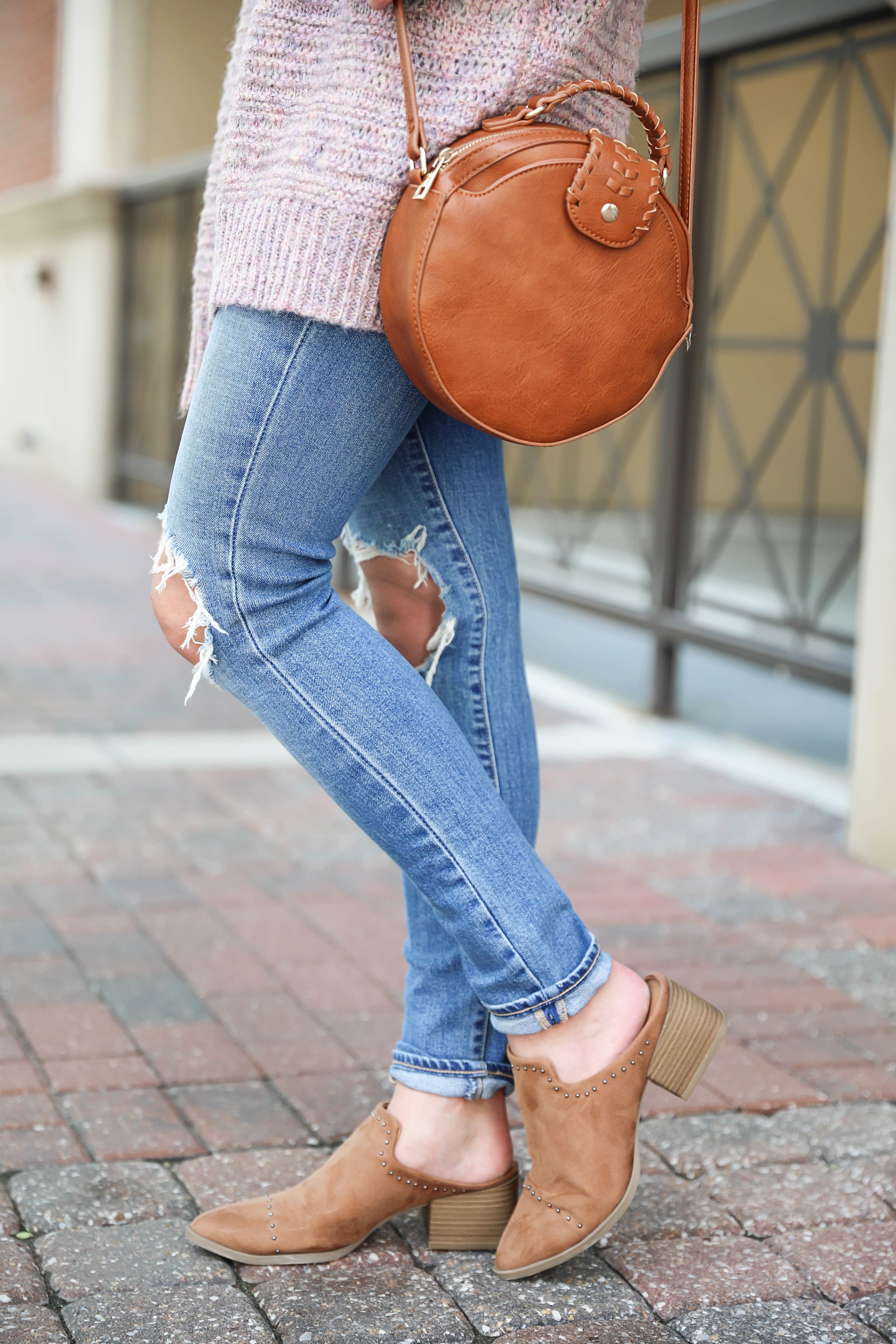 Pink knit cardigan with ripped denim jeans! I paired this look with the cutest pointed toe bootie slides from target! I love Target style, their shoes are so cute! Details on this fall outfit on fashion blog daily dose of charm by lauren lindmark