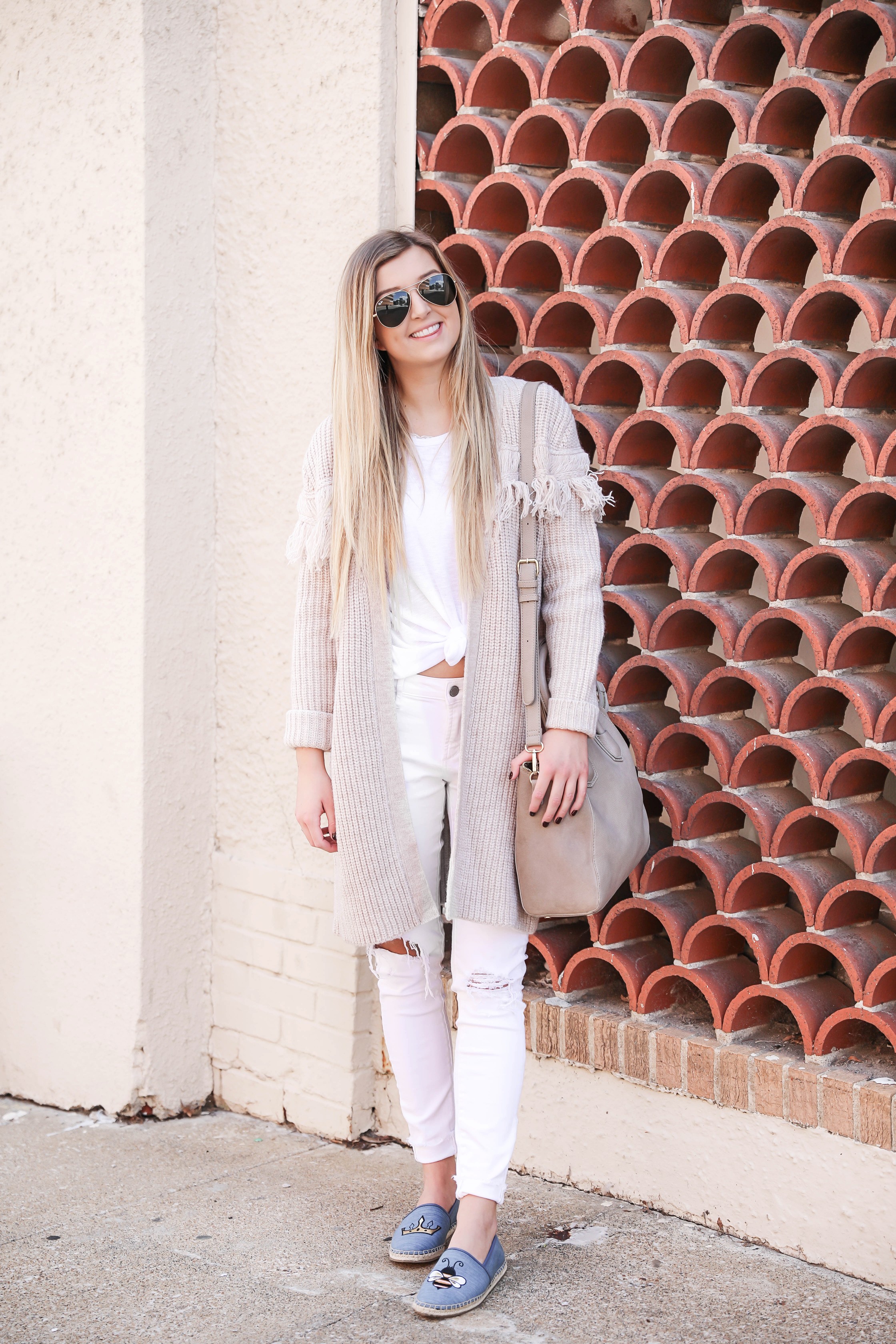 Statement shoes for fall from Stage Stores! I can't stop buying shoes for this season, I am sharing this super cute all white look with these adorable Sam Edelman soludos flats that say "queen bee!" Details on fashion blog daily dose of charm by lauren lindmark