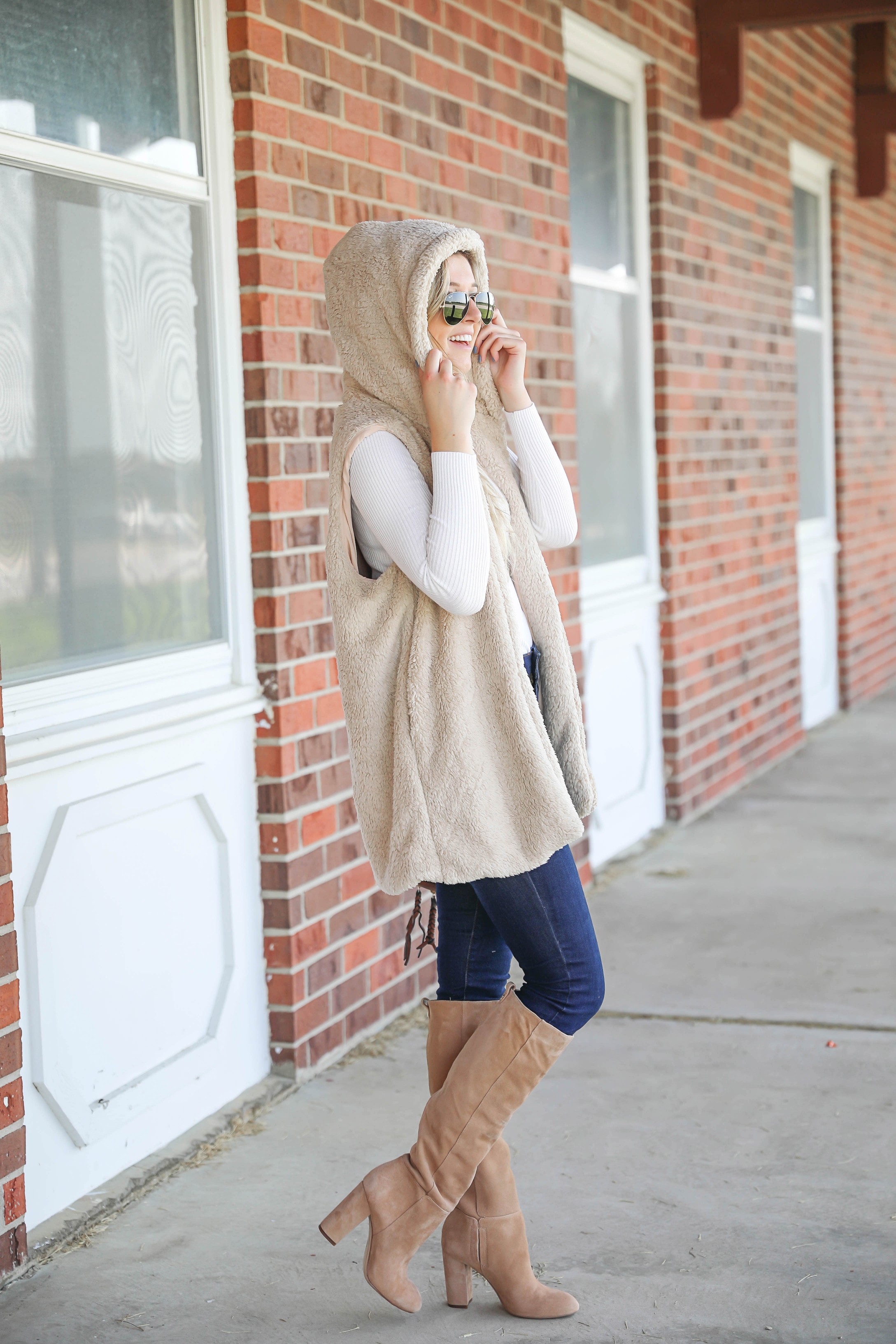 Teddy bear vest for fall! I love soft clothing and this long vest makes for the perfect fall outfit! I paired with a cute white turtleneck and monogram necklace! Plus my favorite shoes for fall are these tan sam edelman boots! Details on fashion blog daily dose of charm by lauren lindmark