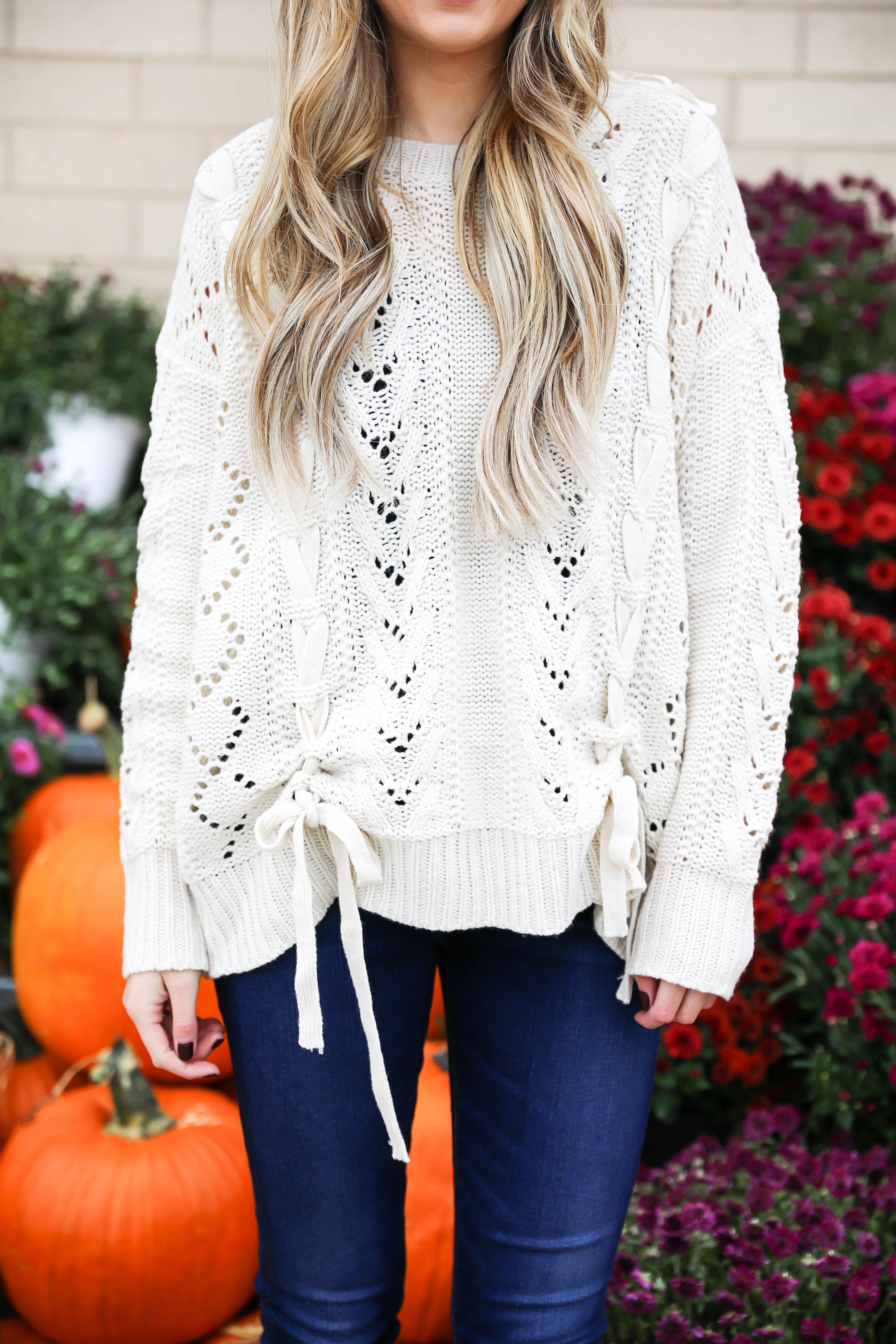 Braided sweater from Core Boutique with dark denim and my favorite felt hat! Fall fashion ideas on fashion blog daily dose of charm by lauren lindmark