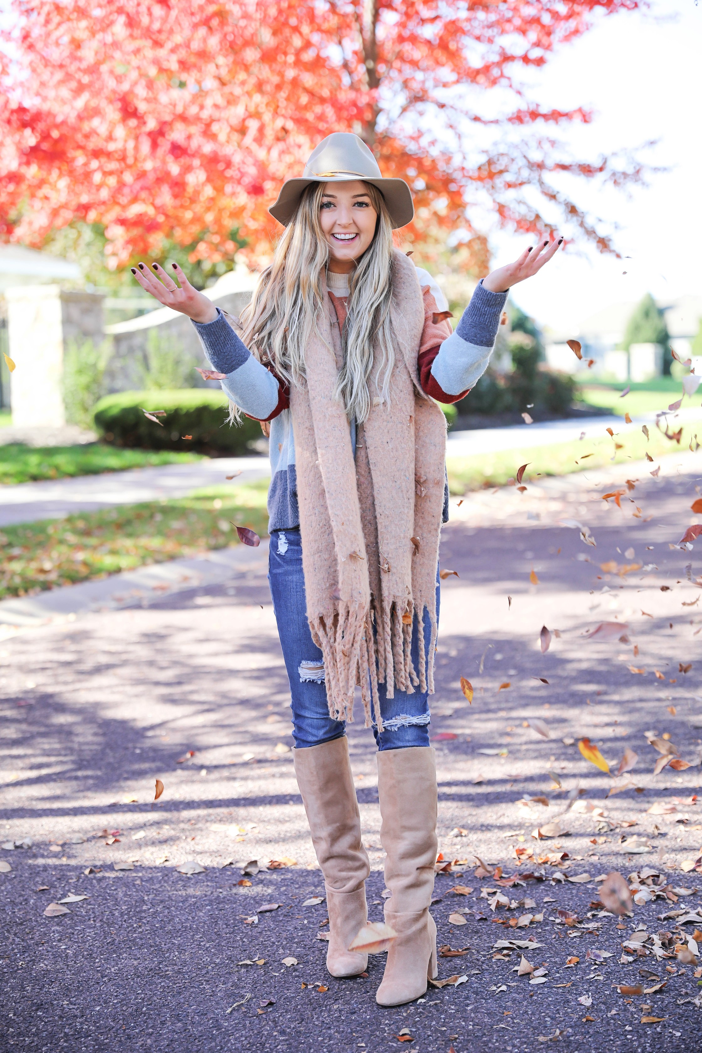 Colorblocking sweater from Madewell! Love this fall leaves picture! This fall outfit is perfect, I especially love the heavy scarf! Detail on fashion blog daily dose of charm by lauren lindmark