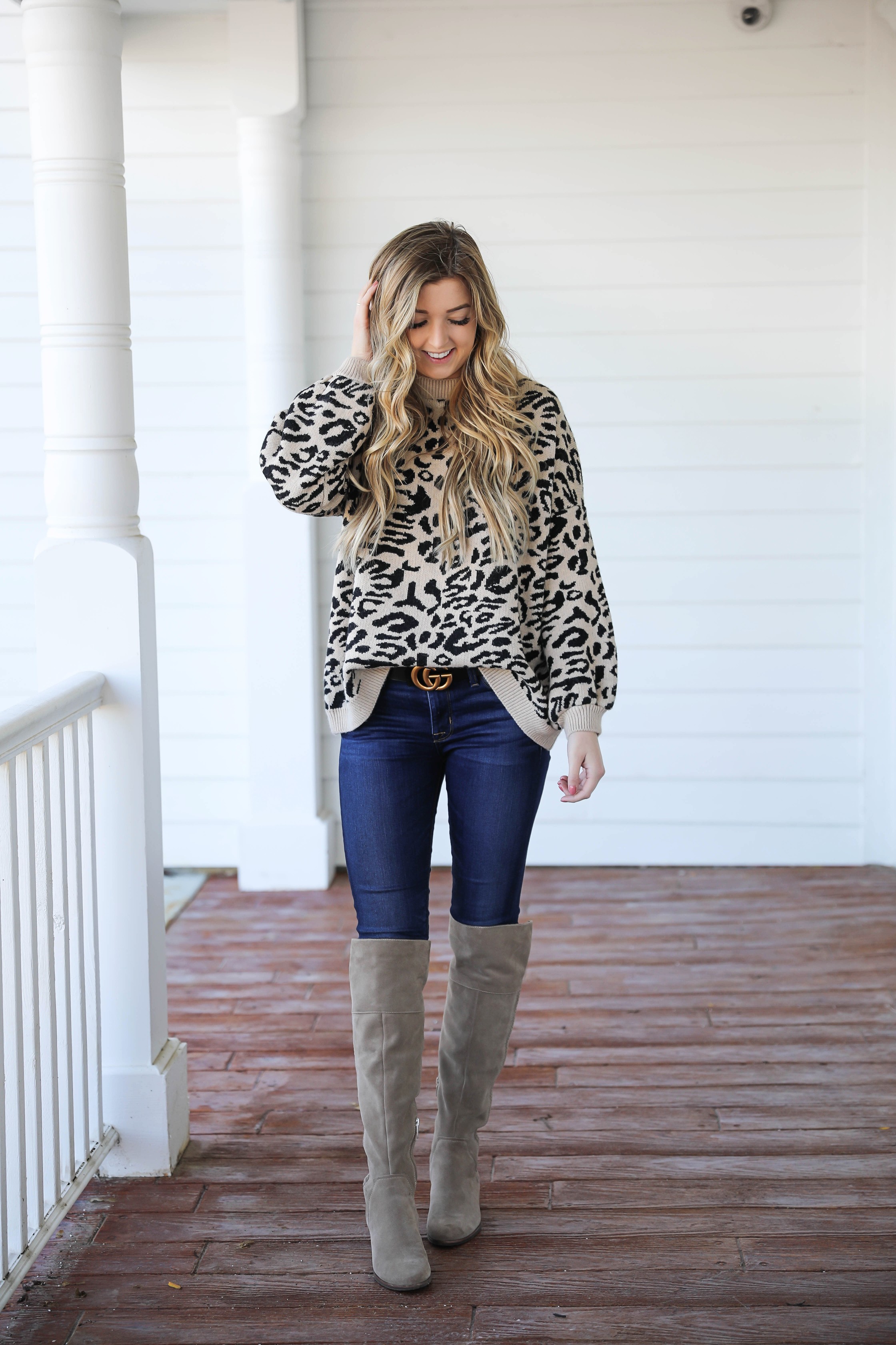 Leopard sweater for fall! Paired with my favorite $30 Gucci belt and Vince Camuto over the knee boots! Such a cute fall outfit idea! Details on fashion blog daily dose of charm by Lauren Lindmark