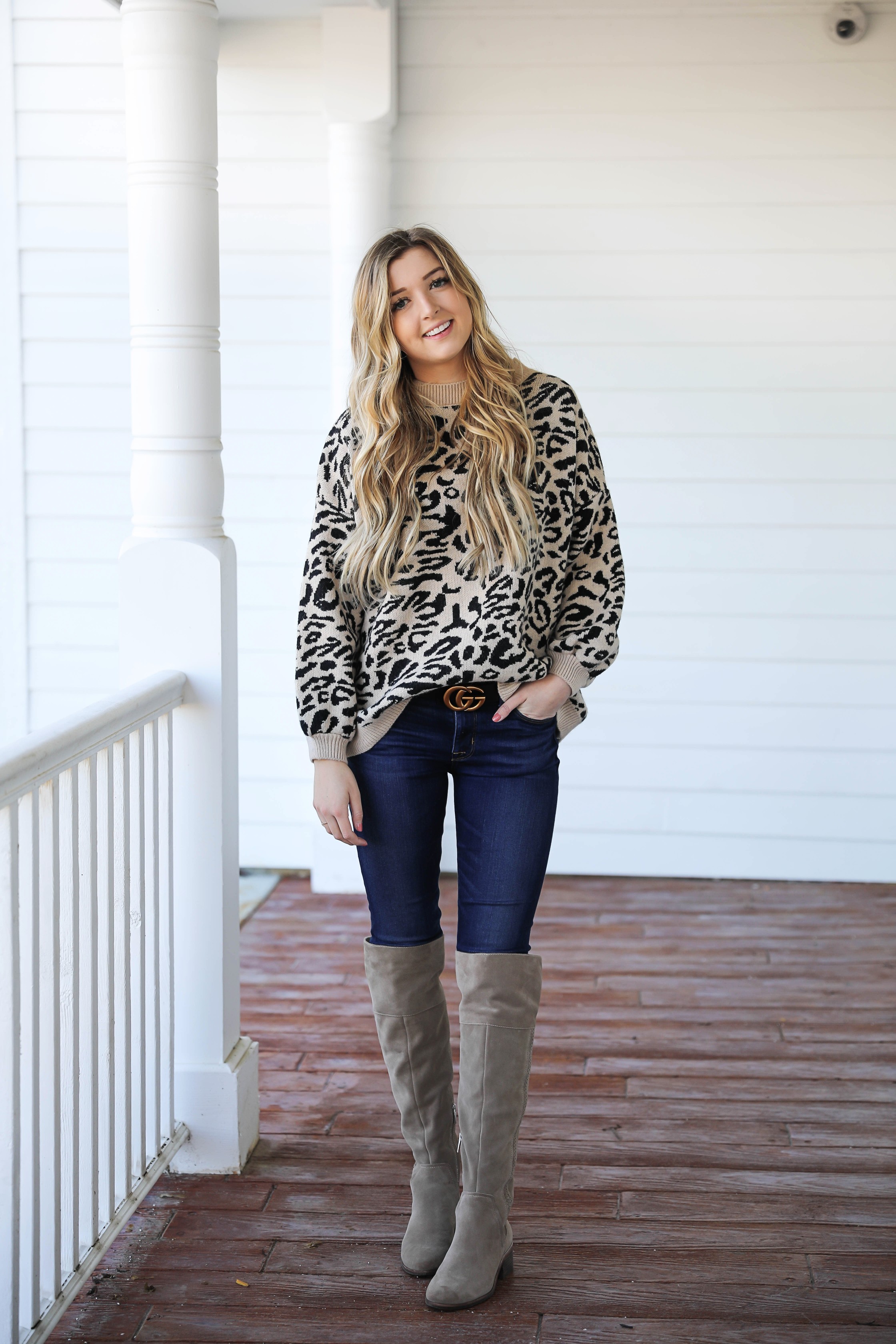 Leopard sweater for fall! Paired with my favorite $30 Gucci belt and Vince Camuto over the knee boots! Such a cute fall outfit idea! Details on fashion blog daily dose of charm by Lauren Lindmark