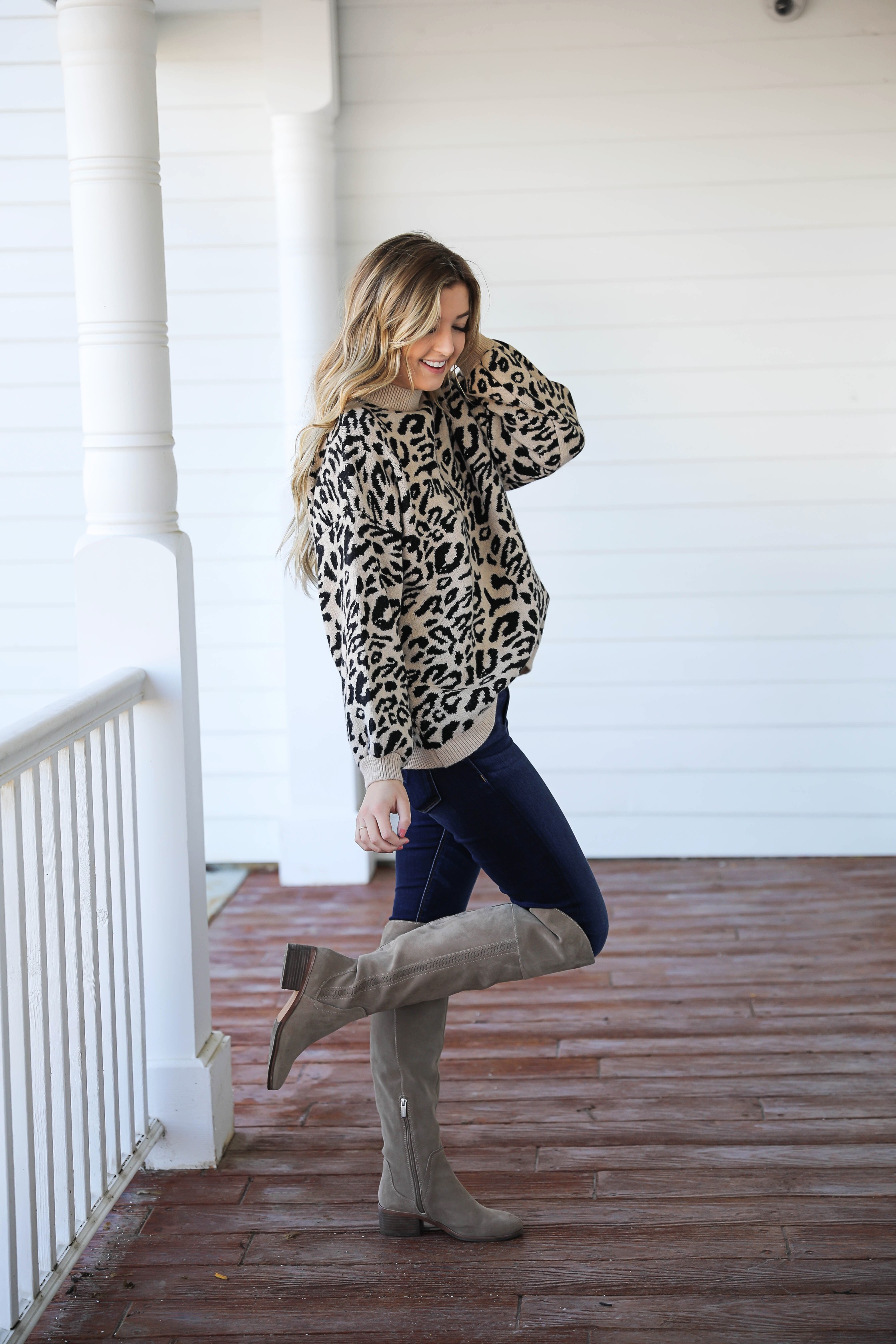 Leopard sweater for fall! Paired with my favorite $30 Gucci belt and Vince Camuto over the knee boots! Such a cute fall outfit idea! Details on fashion blog daily dose of charm by Lauren Lindmark