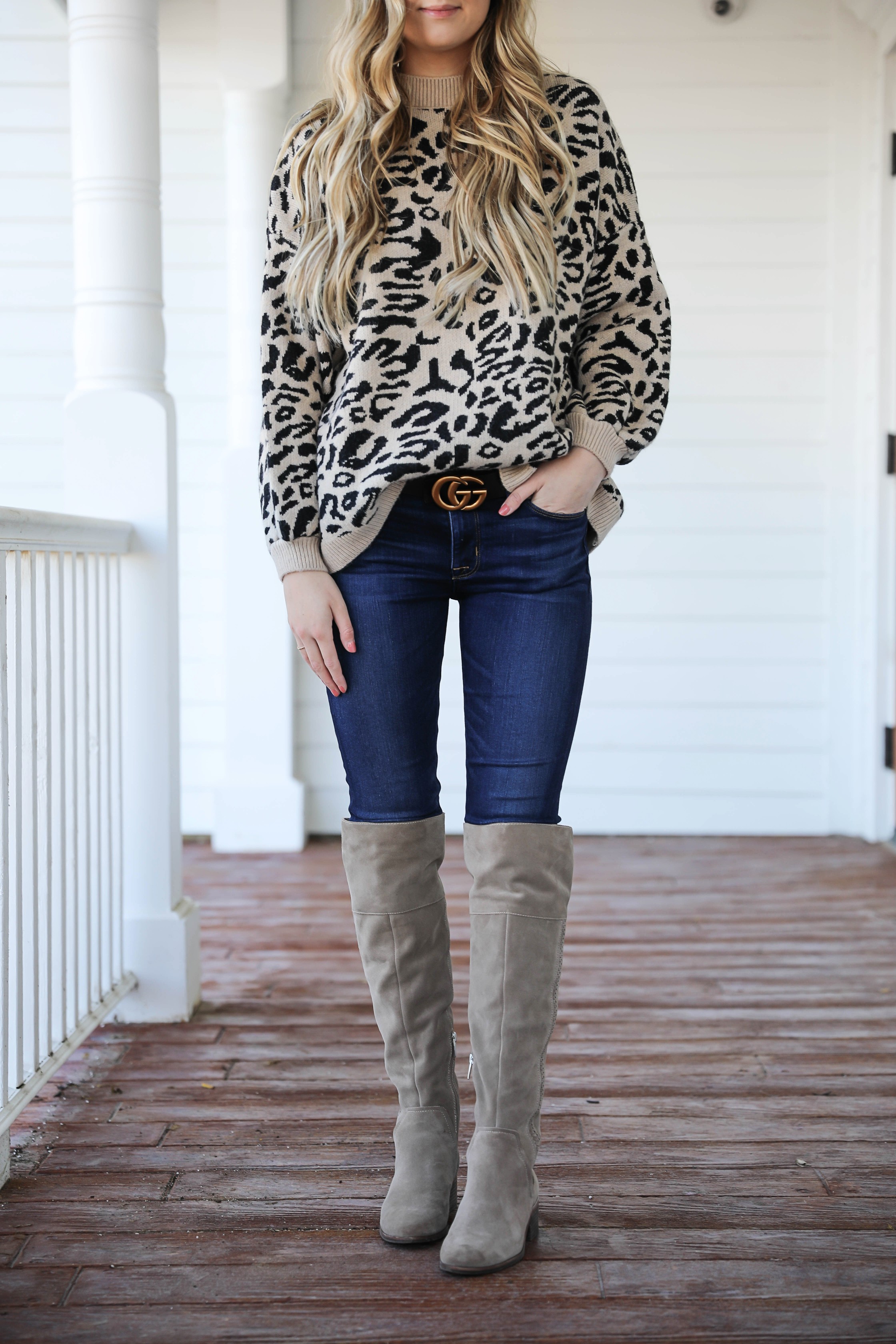 Leopard sweater for fall! Paired with my favorite $30 Gucci belt and Vince Camuto over the knee boots! Such a cute fall outfit idea! Details on fashion blog daily dose of charm by Lauren Lindmark
