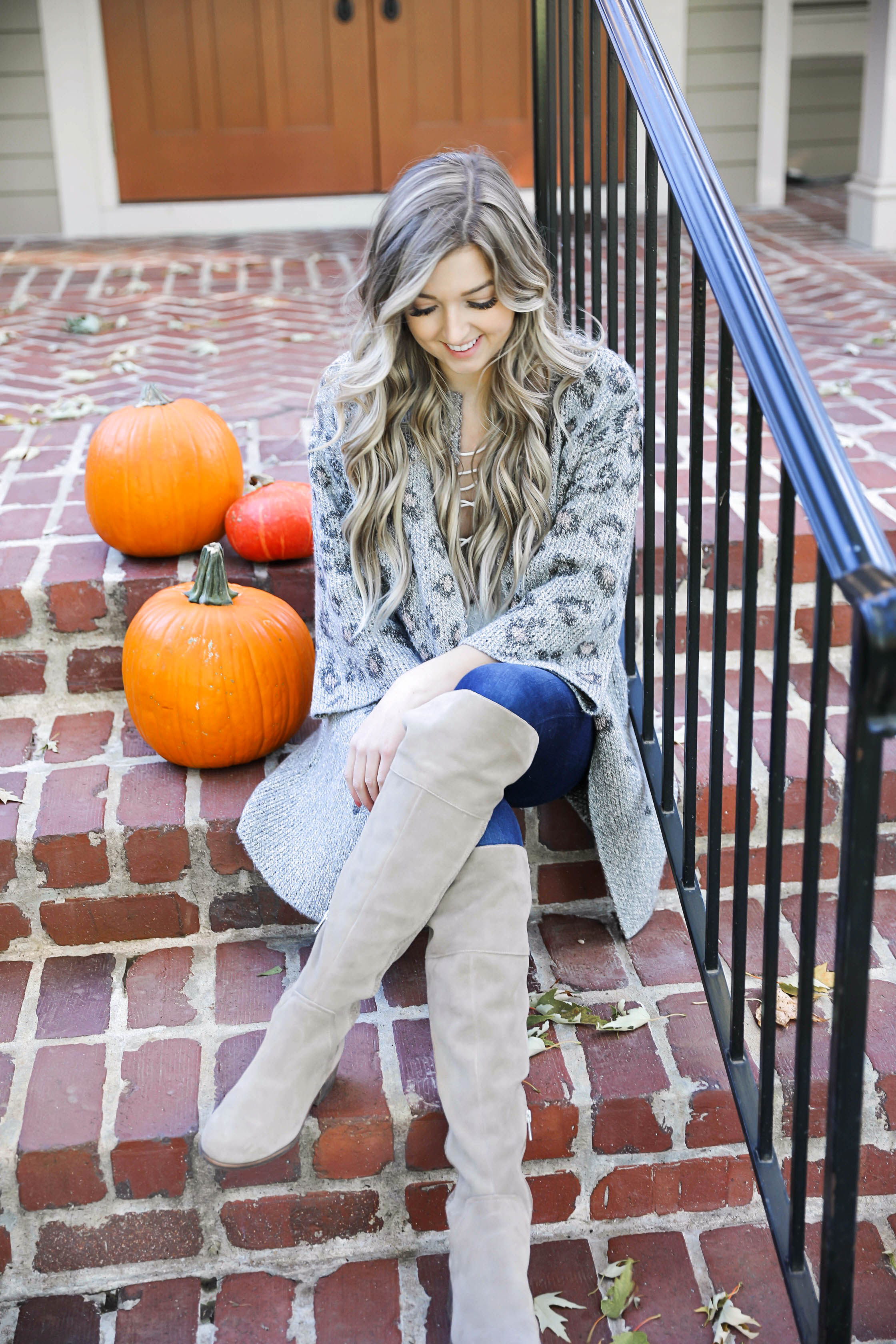 Natural beaded row extensions! The best stylist for NBR extensions in Kansas City is Traci Morby! Fall outfit idea! Sitting on a porch of pumpkins wearing my favorite leopard cardigan! Details on fashion blog daily dose of charm by lauren lindmark