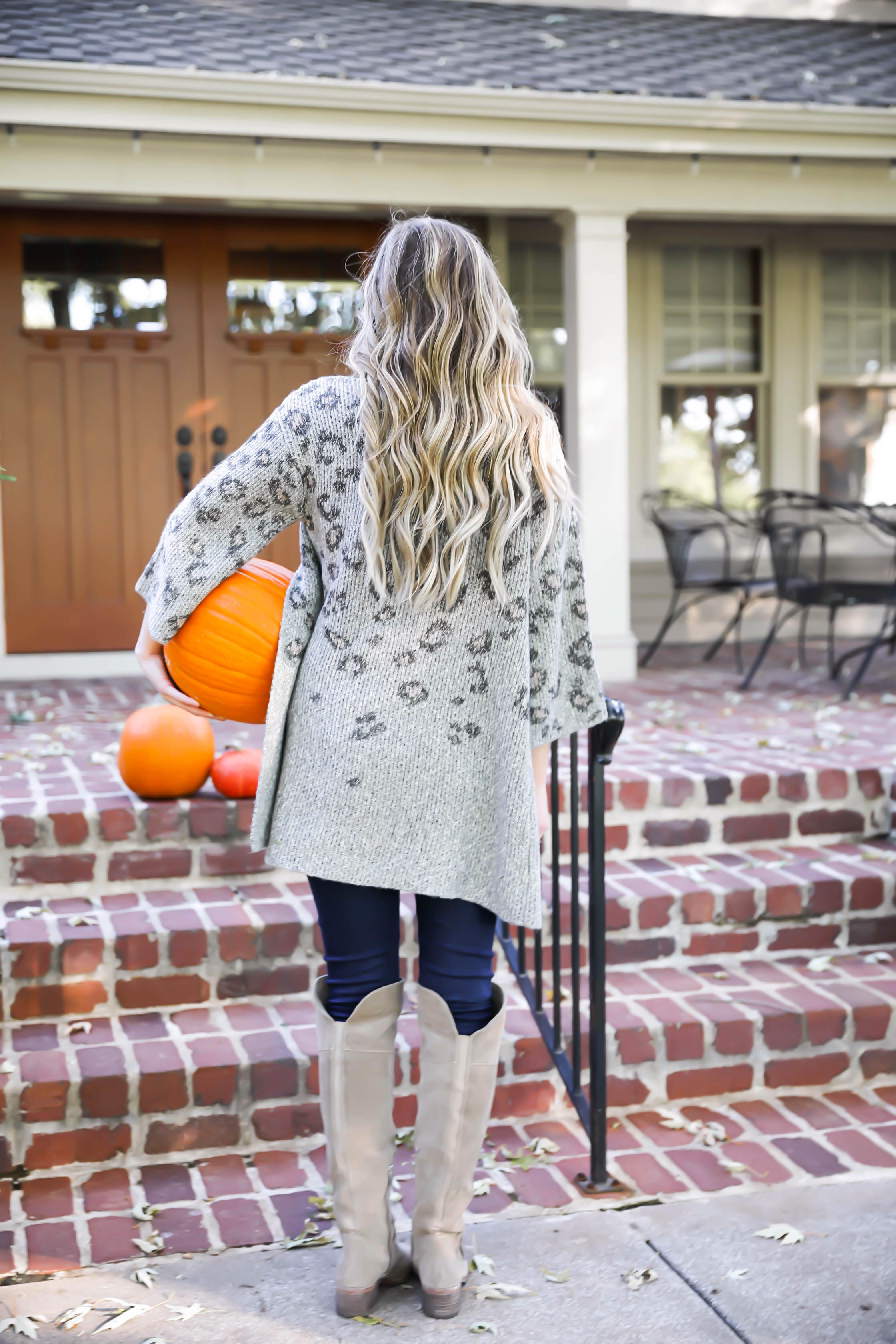 Natural beaded row extensions! The best stylist for NBR extensions in Kansas City is Traci Morby! Fall outfit idea! Sitting on a porch of pumpkins wearing my favorite leopard cardigan! Details on fashion blog daily dose of charm by lauren lindmark