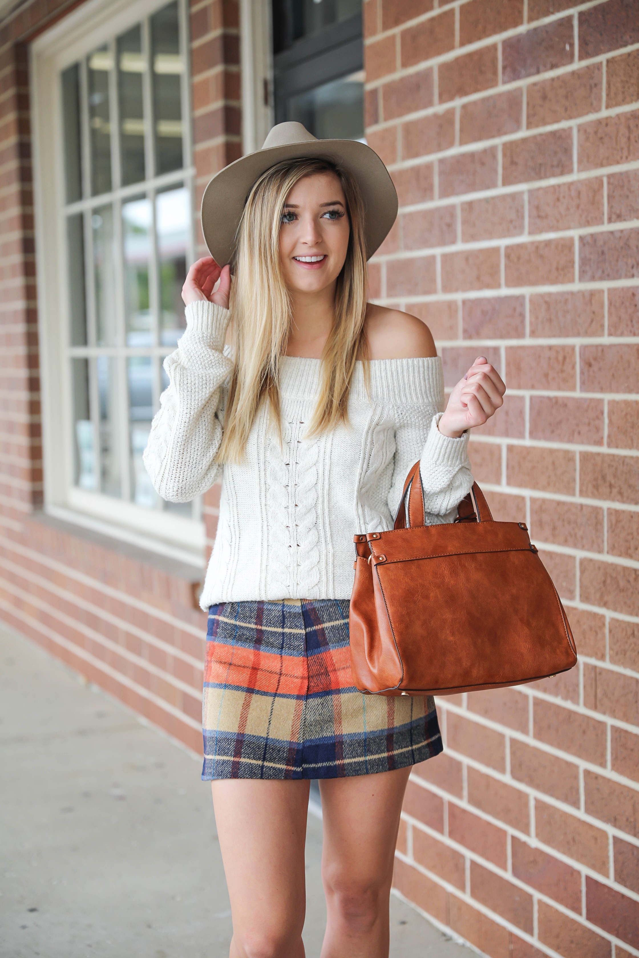 Plaid skirt with a cute cream knit off the shoulder sweater! The cutest fall outfit with a fun faux leather bag! Cute Abercrombie and Fitch and Lulu's fashion! Details on fashion blog daily dose of charm by Lauren Lindmark