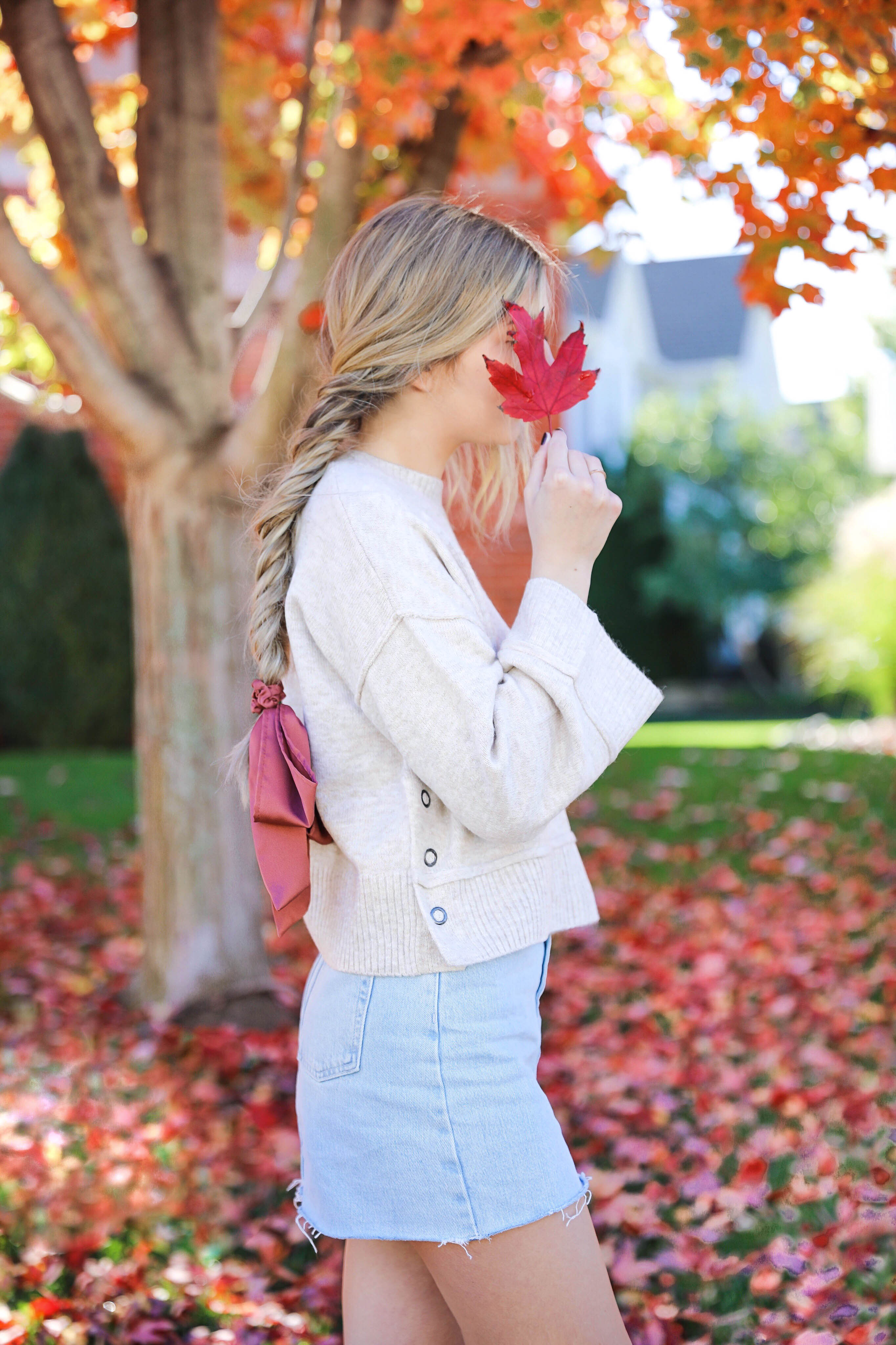 Two ways to style jean skirts in the fall! Jean skirt paired with a cute cardigan and jean skirt paired with a cropped sweater! Details on fashion blog daily dose of charm by lauren lindmark