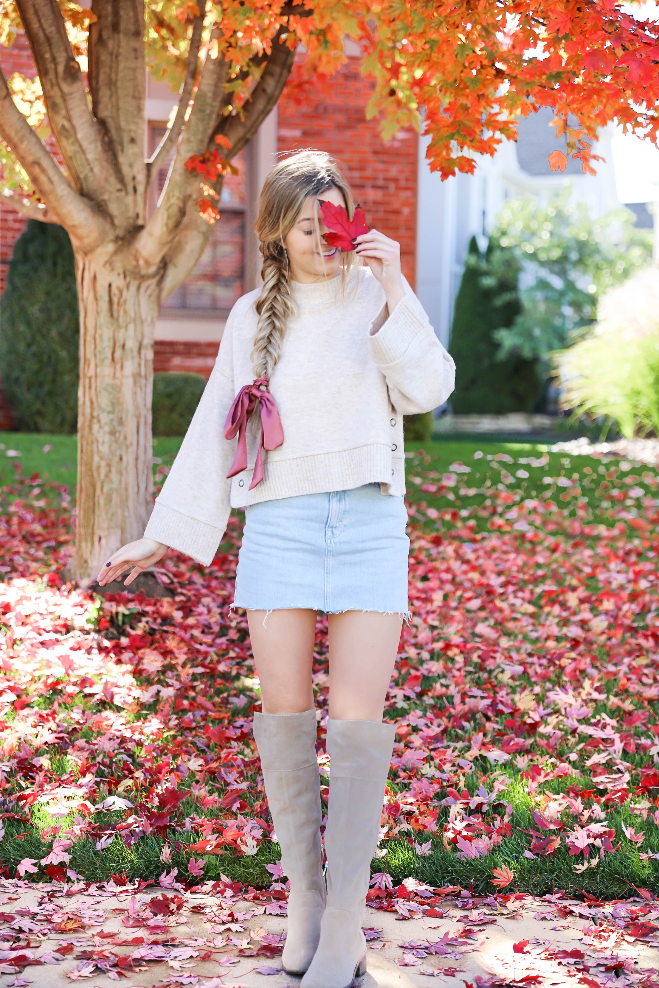 Two ways to style jean skirts in the fall! Jean skirt paired with a cute cardigan and jean skirt paired with a cropped sweater! Details on fashion blog daily dose of charm by lauren lindmark