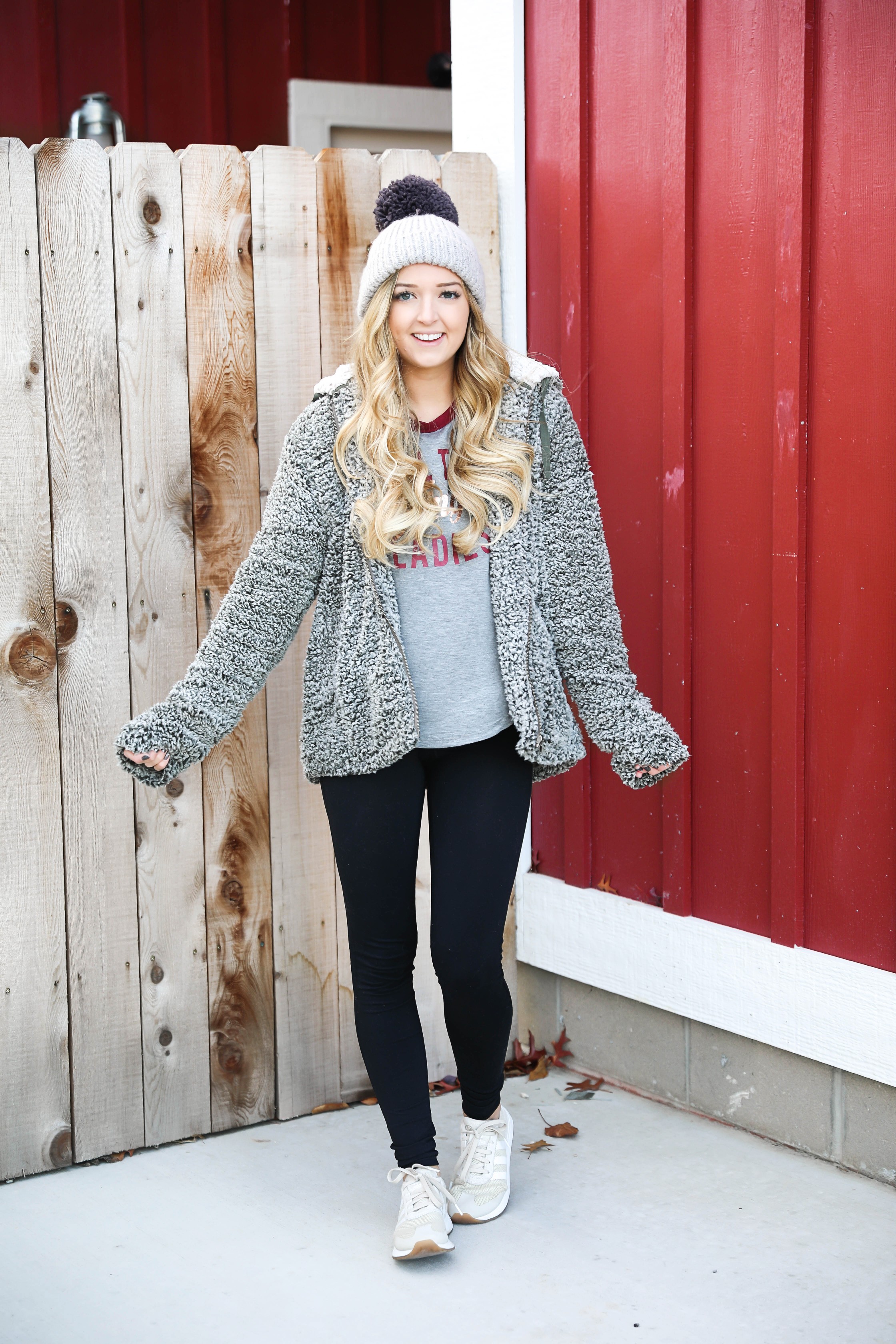 The softest sherpa zip up jacket! This Jacket is so comfortable and adorable for the holidays! I wore it with this cute grey beanie and all the jingle ladies shirt! Cute idea for a comfy winter outfit! Details on fashion blog daily dose of charm by lauren lindmark
