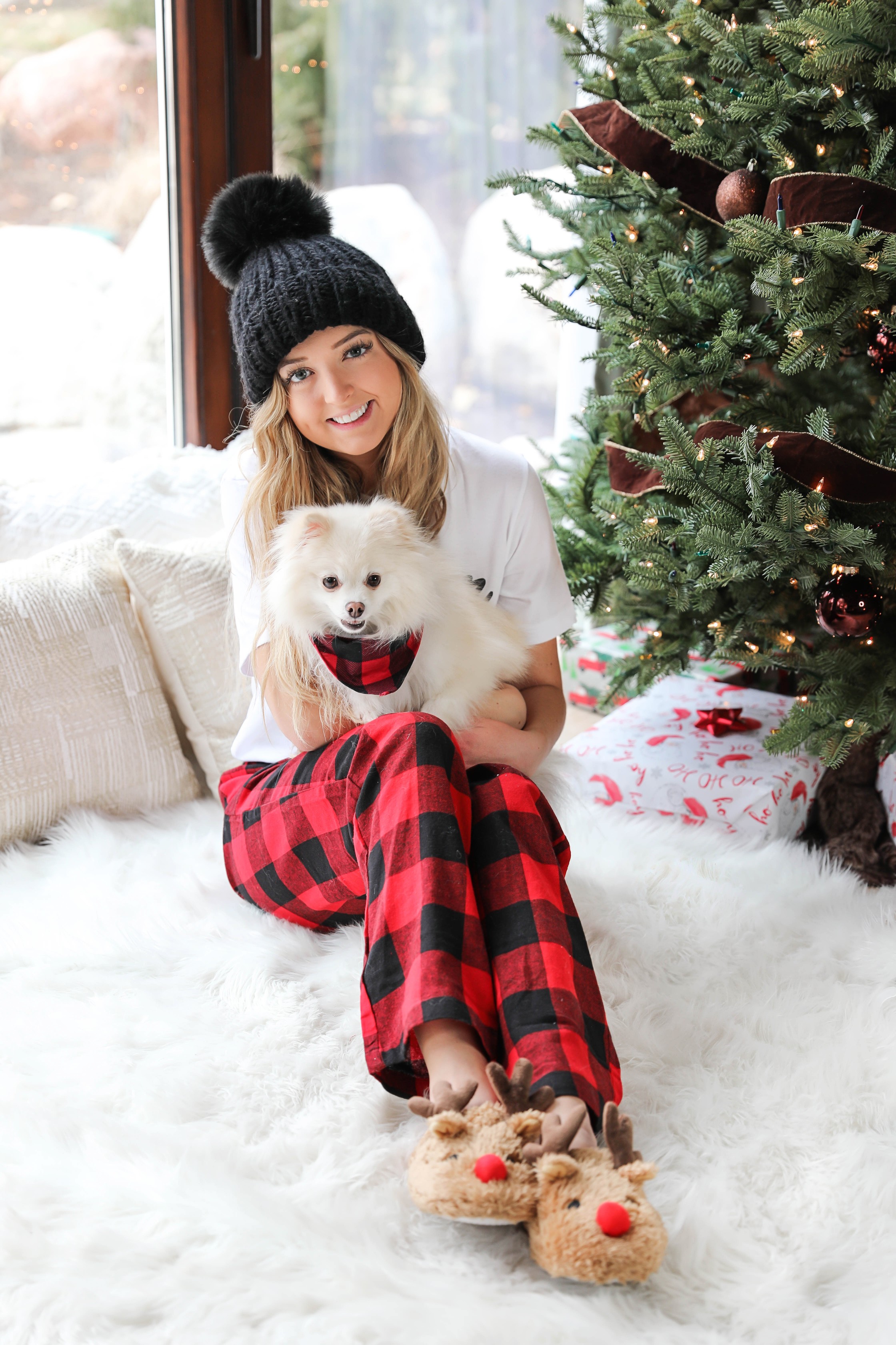Matching pajamas with my puppy! My dog and I wear matching chrismas pjs every year! This is my puppy, beau, the pomeranian! Cute Christmas photoshoot on fashion blog daily dose of charm by lauren lindmark