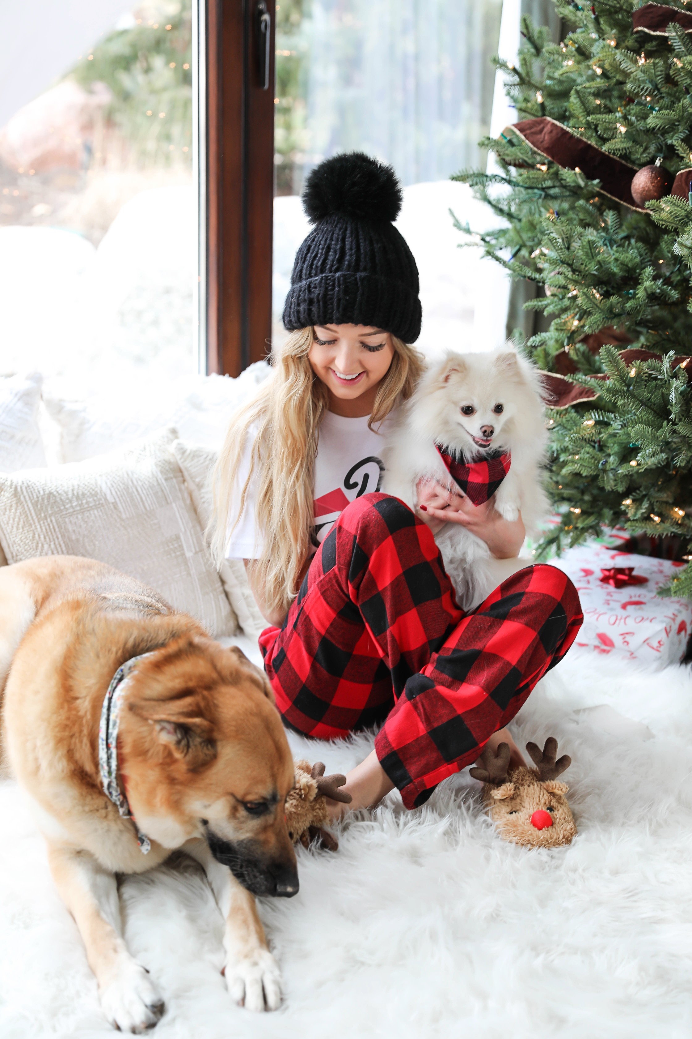 Matching pajamas with my puppy! My dog and I wear matching chrismas pjs every year! This is my puppy, beau, the pomeranian! Cute Christmas photoshoot on fashion blog daily dose of charm by lauren lindmark