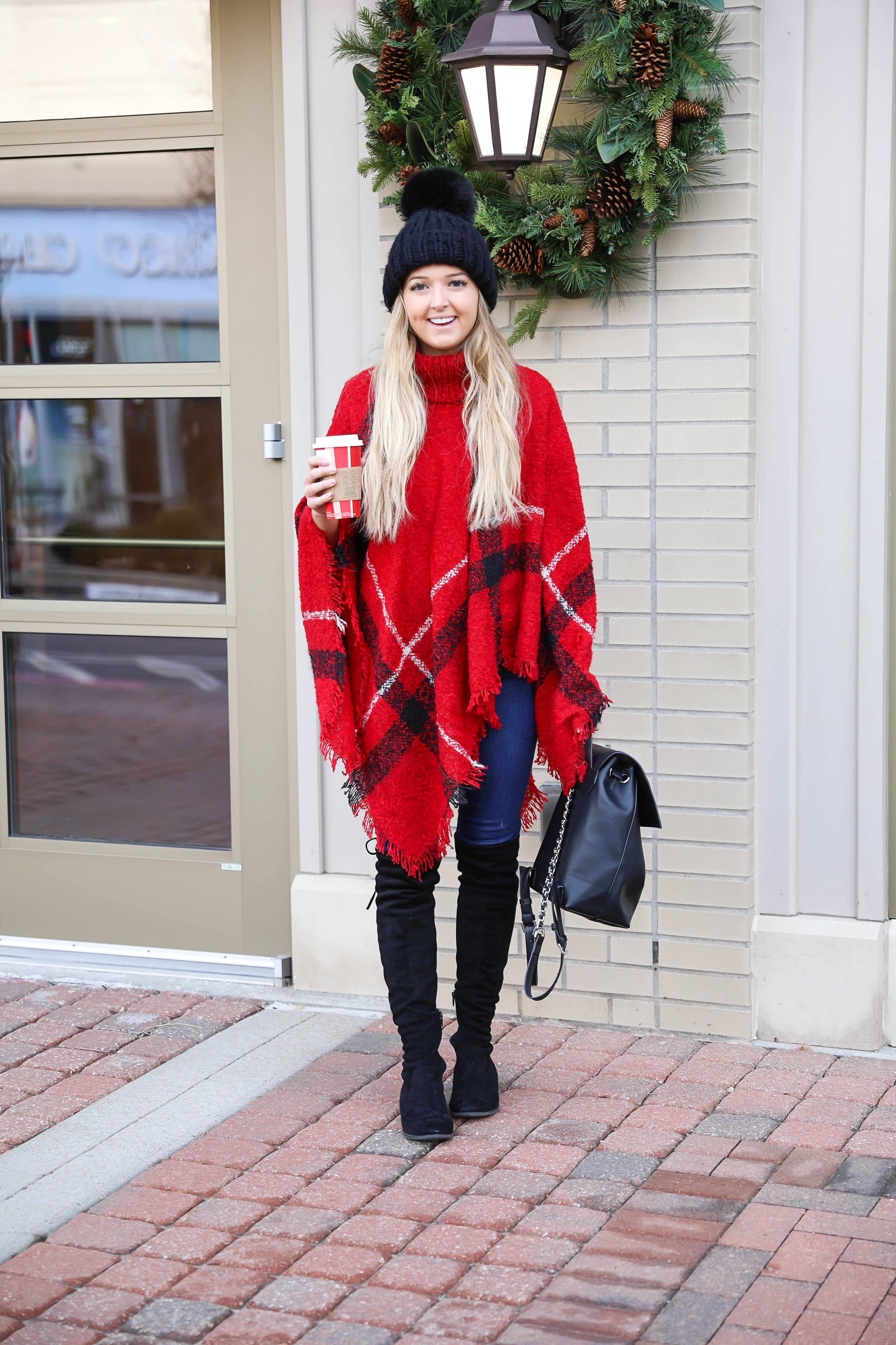 Red plaid Christmas poncho with the cutest turtleneck! I got this cute outfit from the Pink Lily Boutique! I love winter fashion, this holiday outfit would make for a cute Christmas look! Details on the blog daily dose of charm by lauren lindmark