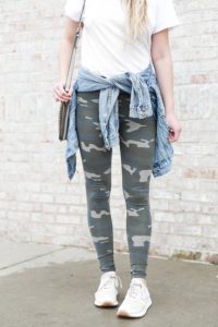 Cute camo leggings paired with a plain white tee and jean jacket! Cute way to style camo leggings, I love this trend! Camouflage is so in and makes of a cute winter outfit! This would also be cute for spring style or any time of year you want a casual look! Details on fashion blog daily dose of charm by lauren lindmark