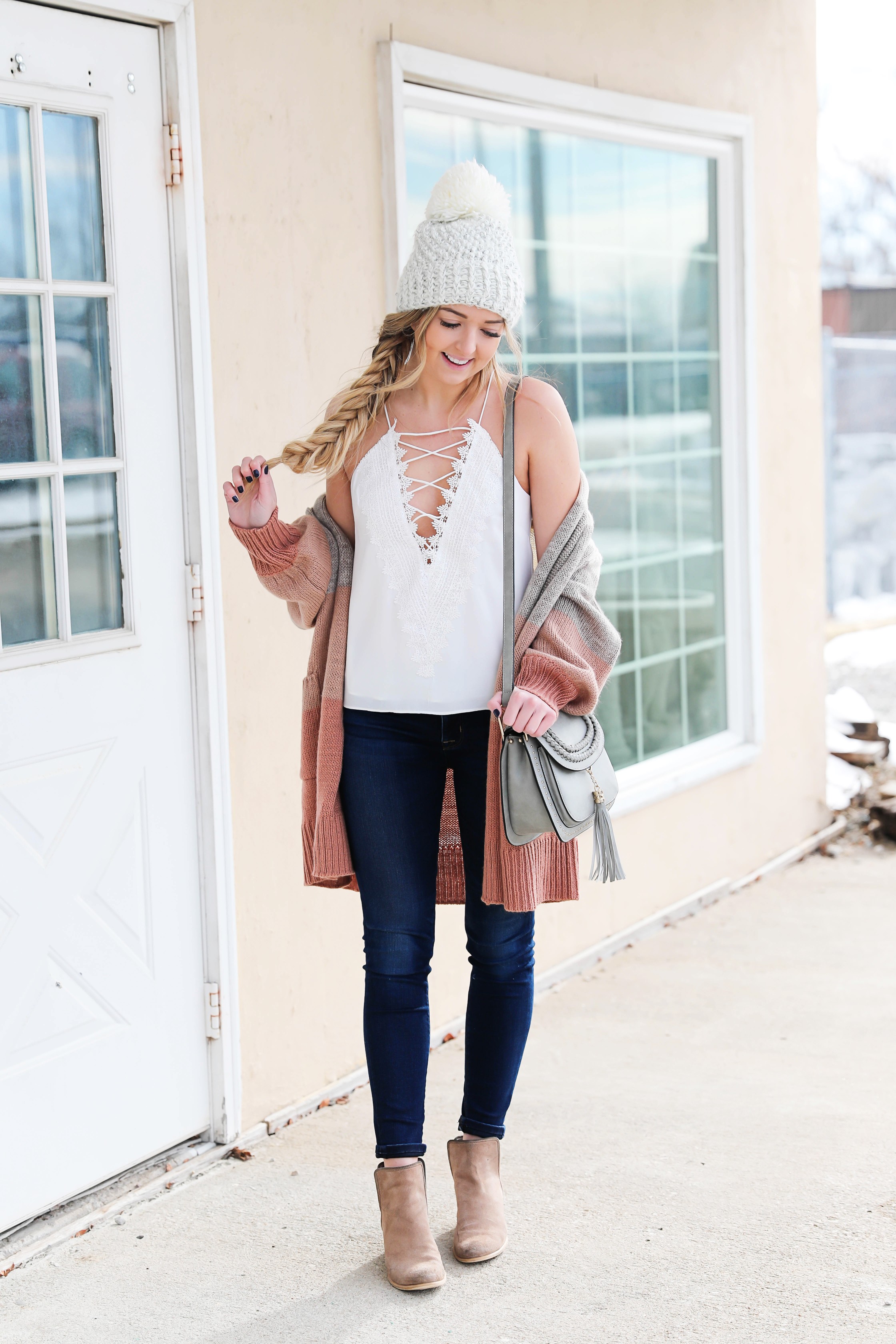 Color block cardigan from target! I am obsessed with all of Target's clothing! I styled it with my favorite Madewell dark jeans, a cute white beanie, and lace cami! I also answer all your questions in this post! Such a fun Q&A! Winter to spring outfit details on the blog daily dose of charm by lauren lindmark