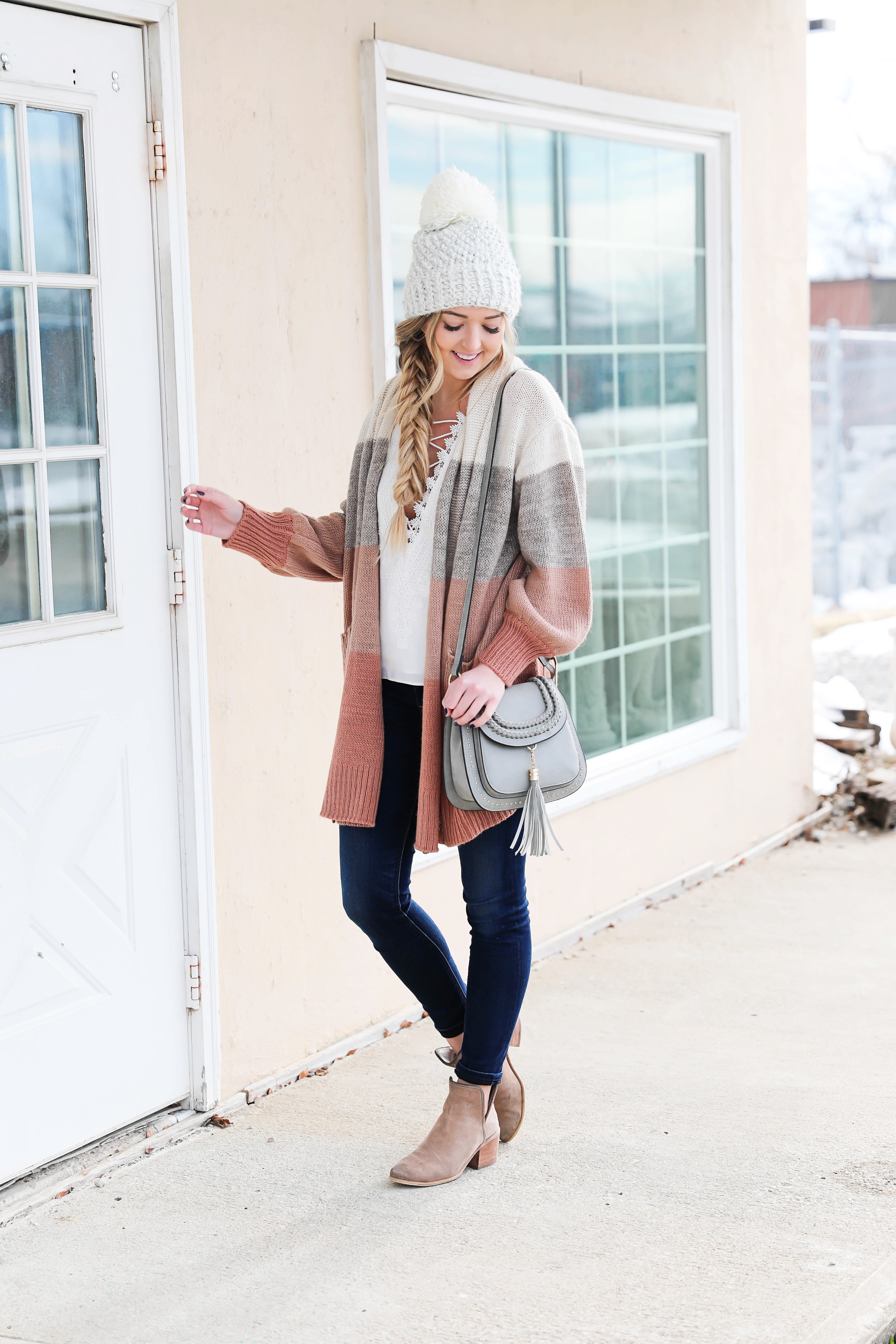 Color block cardigan from target! I am obsessed with all of Target's clothing! I styled it with my favorite Madewell dark jeans, a cute white beanie, and lace cami! I also answer all your questions in this post! Such a fun Q&A! Winter to spring outfit details on the blog daily dose of charm by lauren lindmark