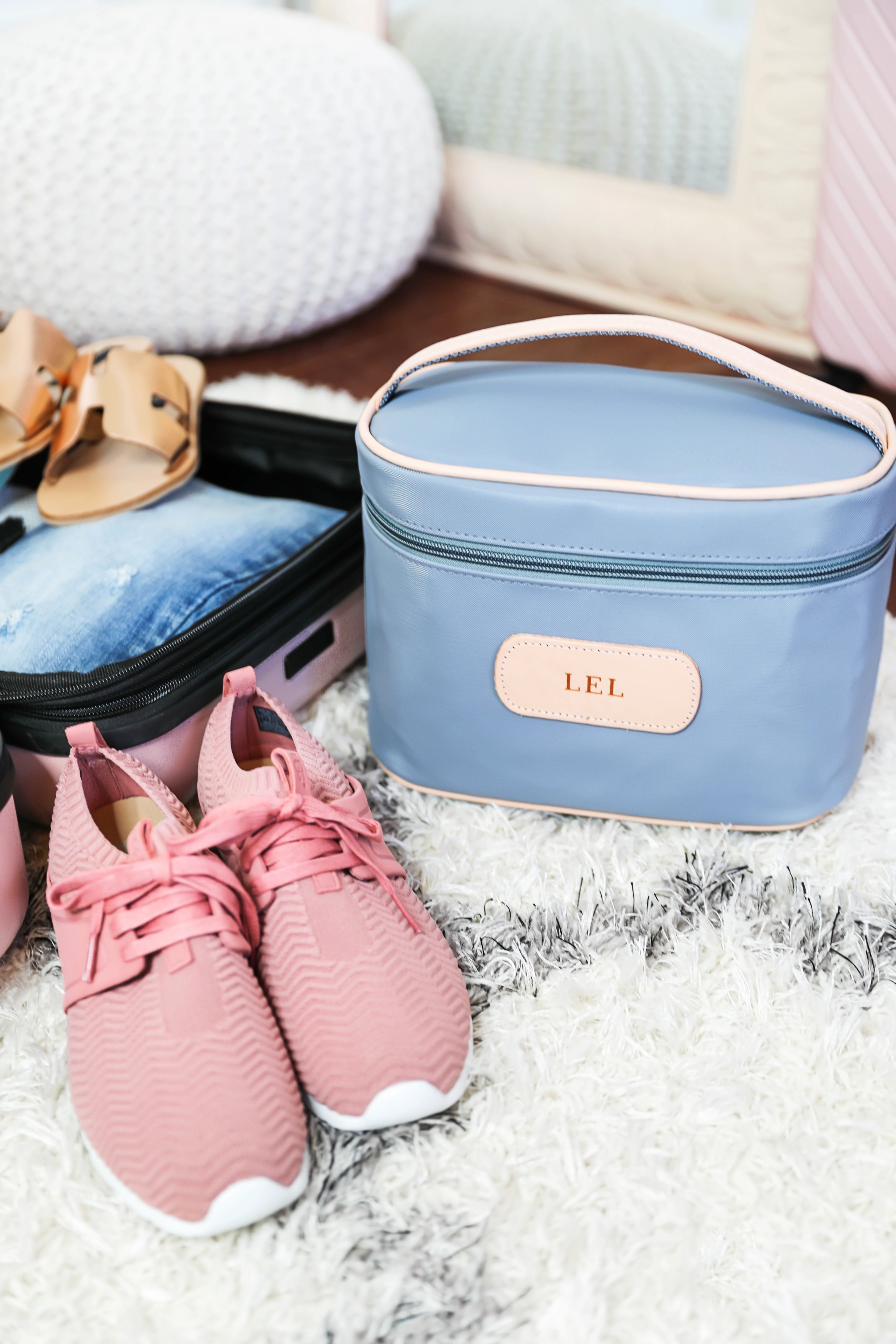 Packing tips for a trip from the queen of overpacking! I use the cutest Nordstrom suitcase and Jon Hart luggage for my trips! Spring break packing with the latest spring trends! How cute are these ugg sneakers, Marc Fisher wedges? Details on fashion blog daily dose of charm by lauren lindmark