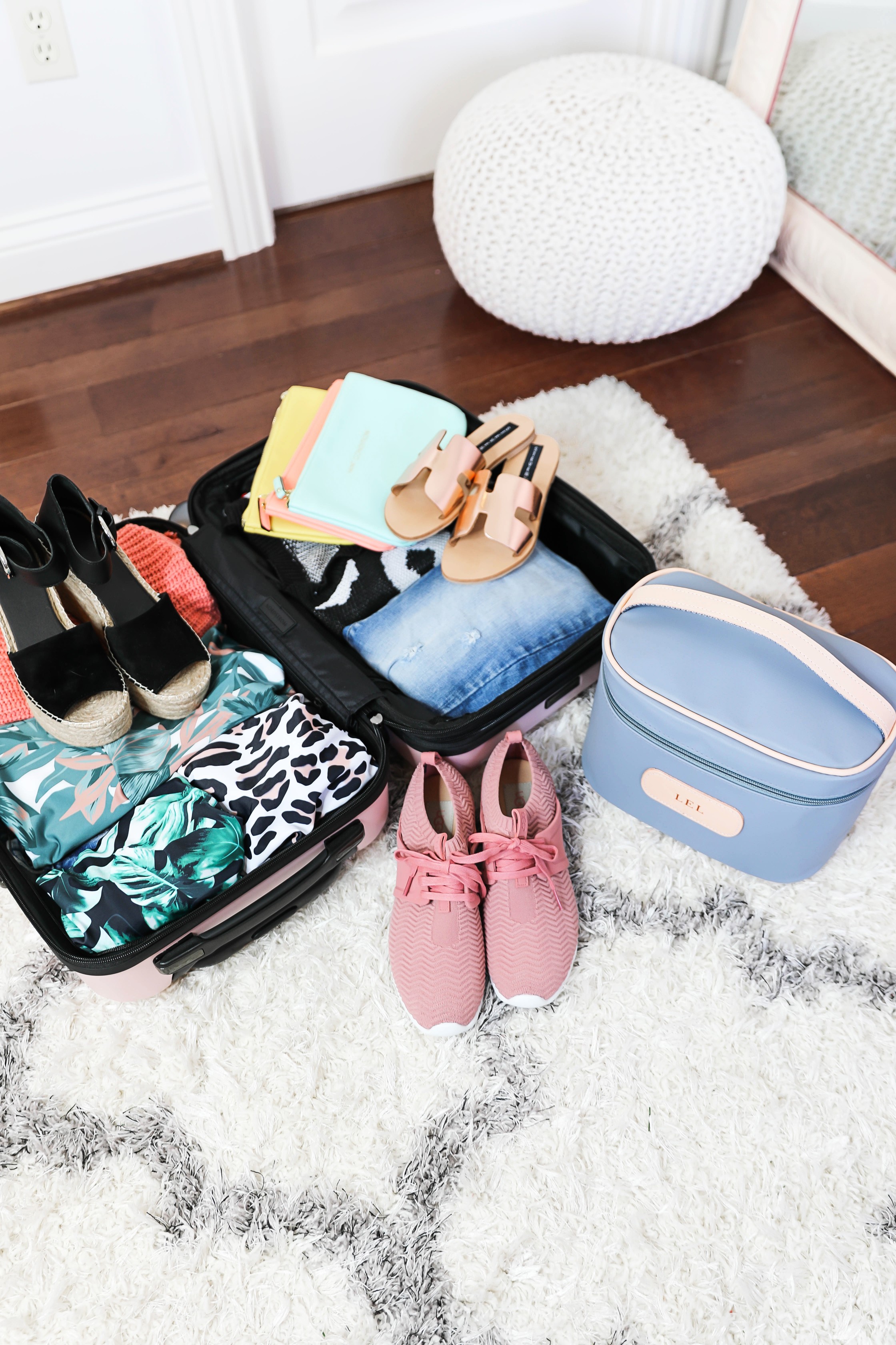 Packing tips for a trip from the queen of overpacking! I use the cutest Nordstrom suitcase and Jon Hart luggage for my trips! Spring break packing with the latest spring trends! How cute are these ugg sneakers, Marc Fisher wedges? Details on fashion blog daily dose of charm by lauren lindmark