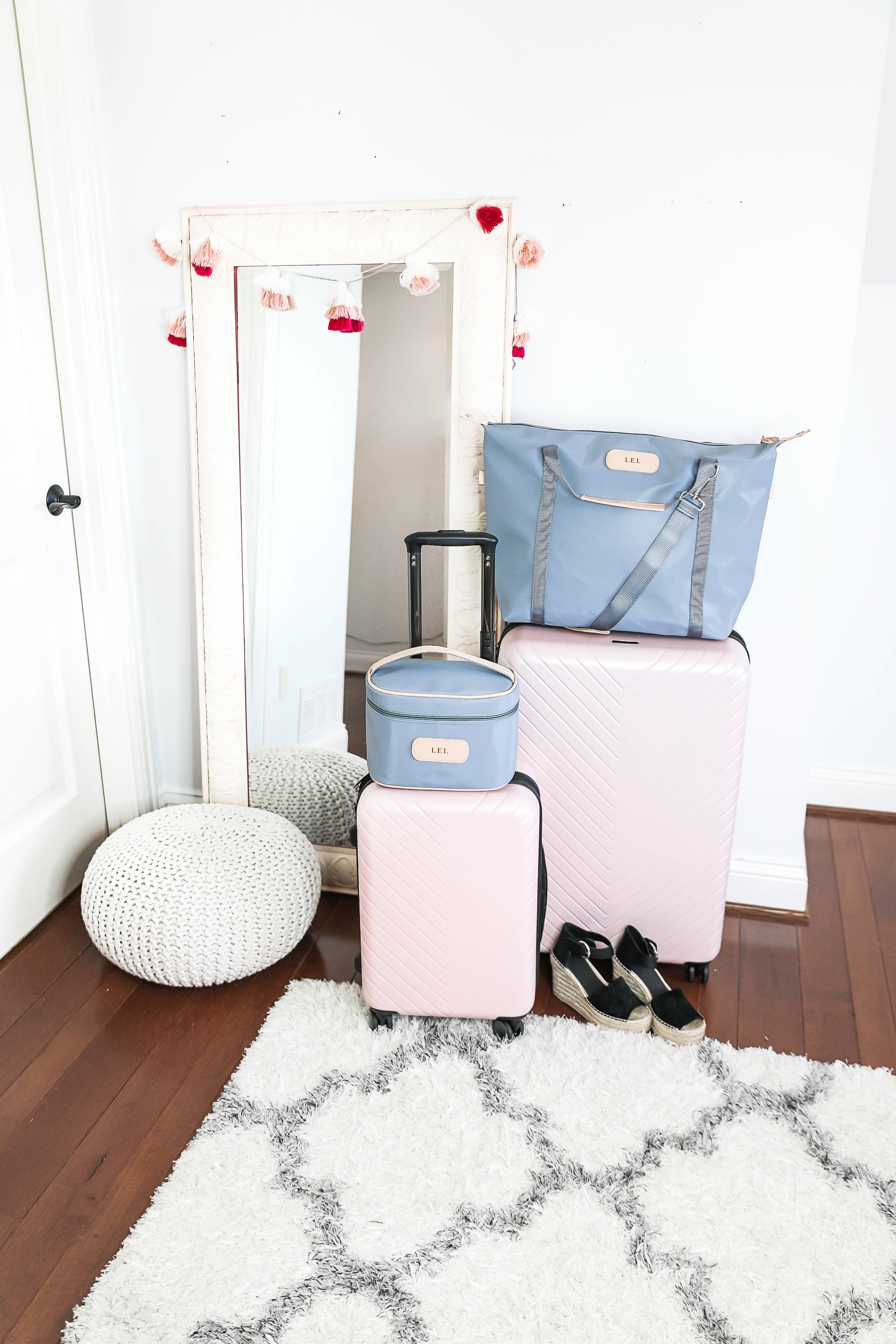 Packing tips for a trip from the queen of overpacking! I use the cutest Nordstrom suitcase and Jon Hart luggage for my trips! Spring break packing with the latest spring trends! How cute are these ugg sneakers, Marc Fisher wedges? Details on fashion blog daily dose of charm by lauren lindmark