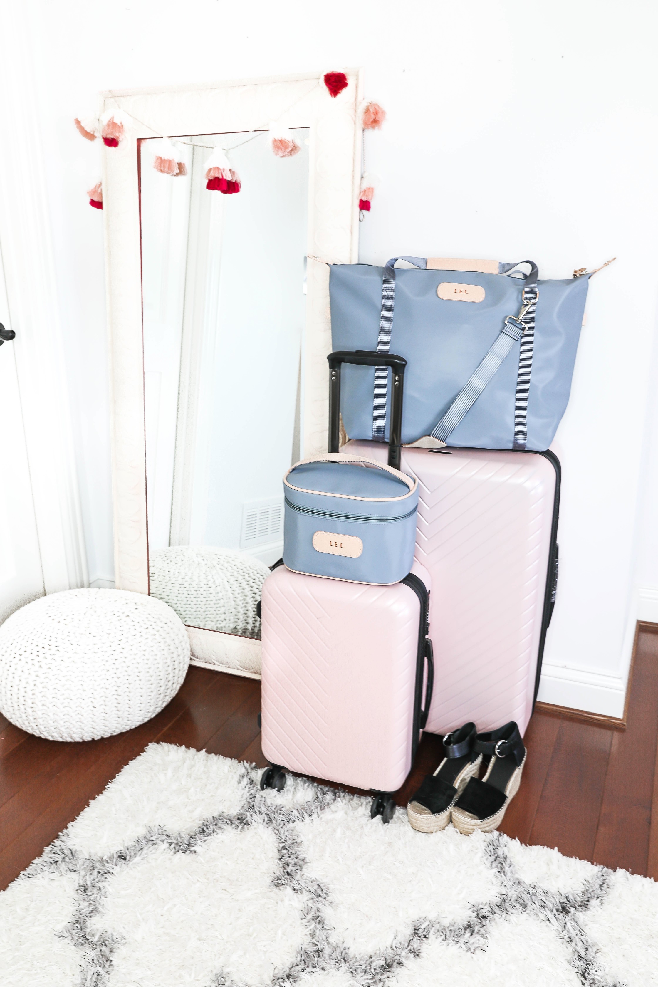 Packing tips for a trip from the queen of overpacking! I use the cutest Nordstrom suitcase and Jon Hart luggage for my trips! Spring break packing with the latest spring trends! How cute are these ugg sneakers, Marc Fisher wedges? Details on fashion blog daily dose of charm by lauren lindmark