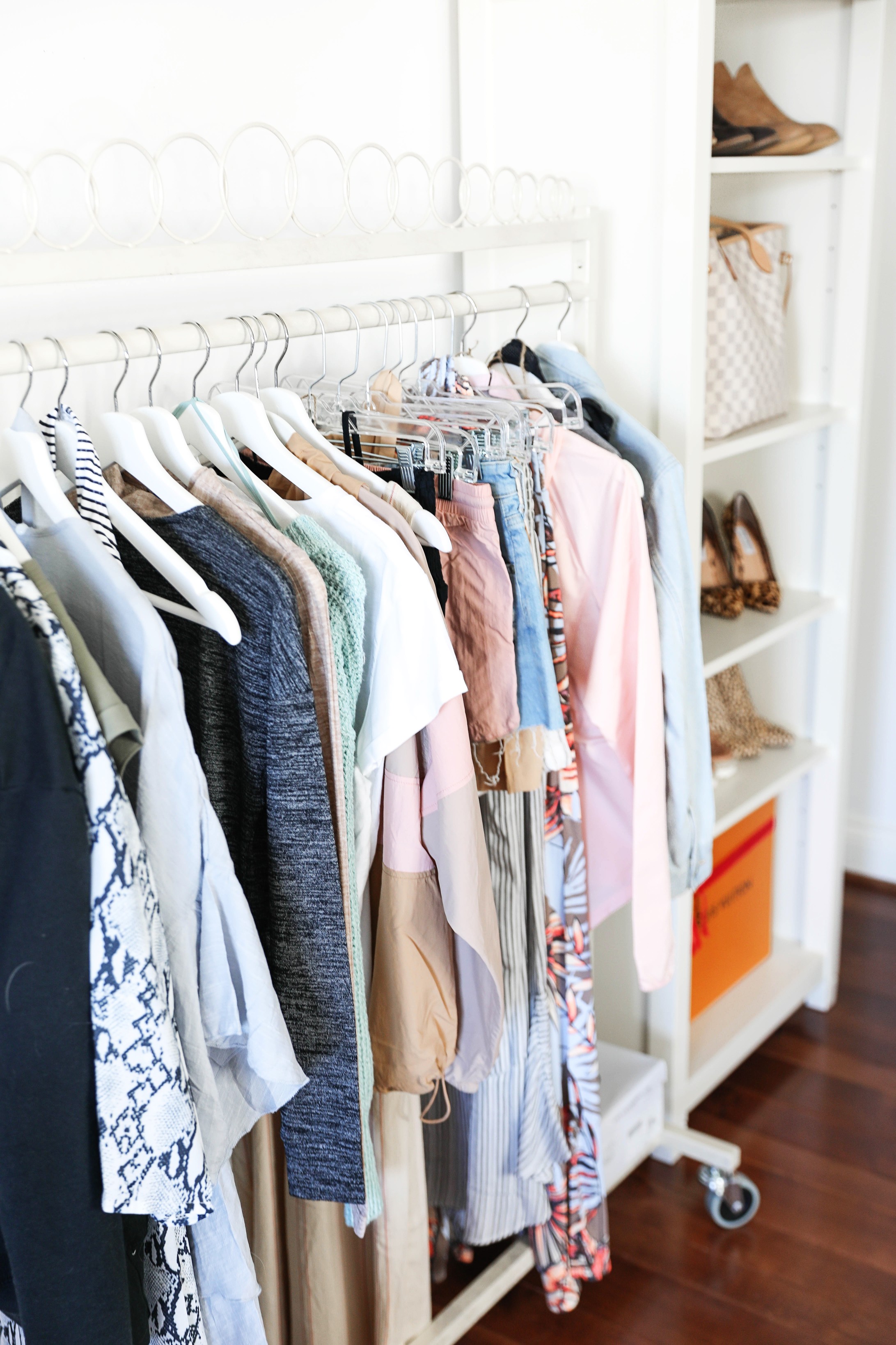 How I plan my outfits for trips and blog photos! Total closet and wardrobe goals! I love my new garment rack right next to my shoe rack and fashion shelves! All the travel packing planning tips you need! Details on fashion blog daily dose of charm by lauren lindmark