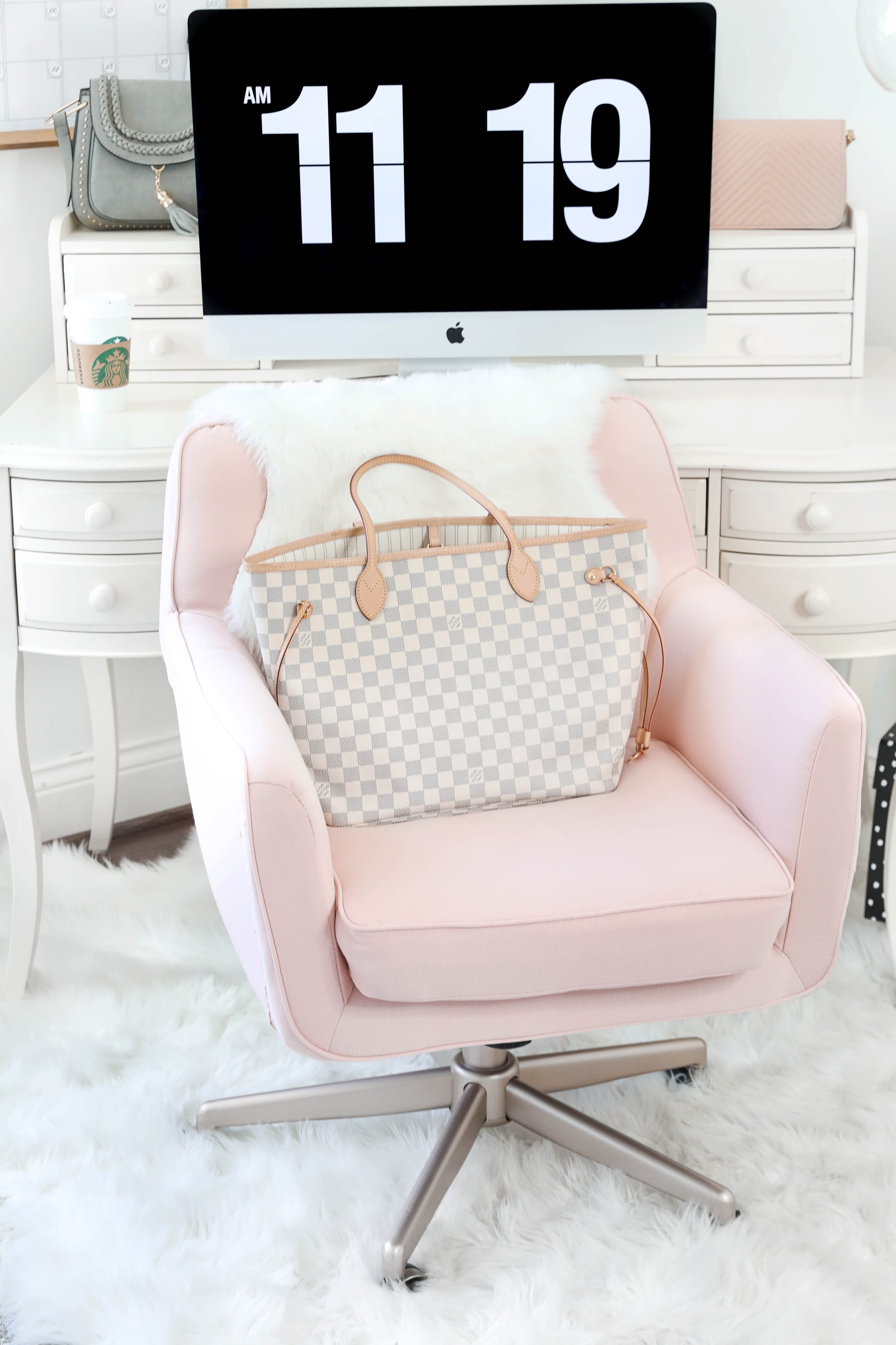 Office tour! Ultimate desk goals for the girl boss! I love this super comfy pink desk chair! I had been looking for a new chair and found the perfect one! The space looks so cute with my faux sheep fuzzy rug, and all the white, black, gold and pink. This is also the cutest gold dry erase calendar! Details on fashion and lifestyle blog daily dose of charm by lauren lindmark