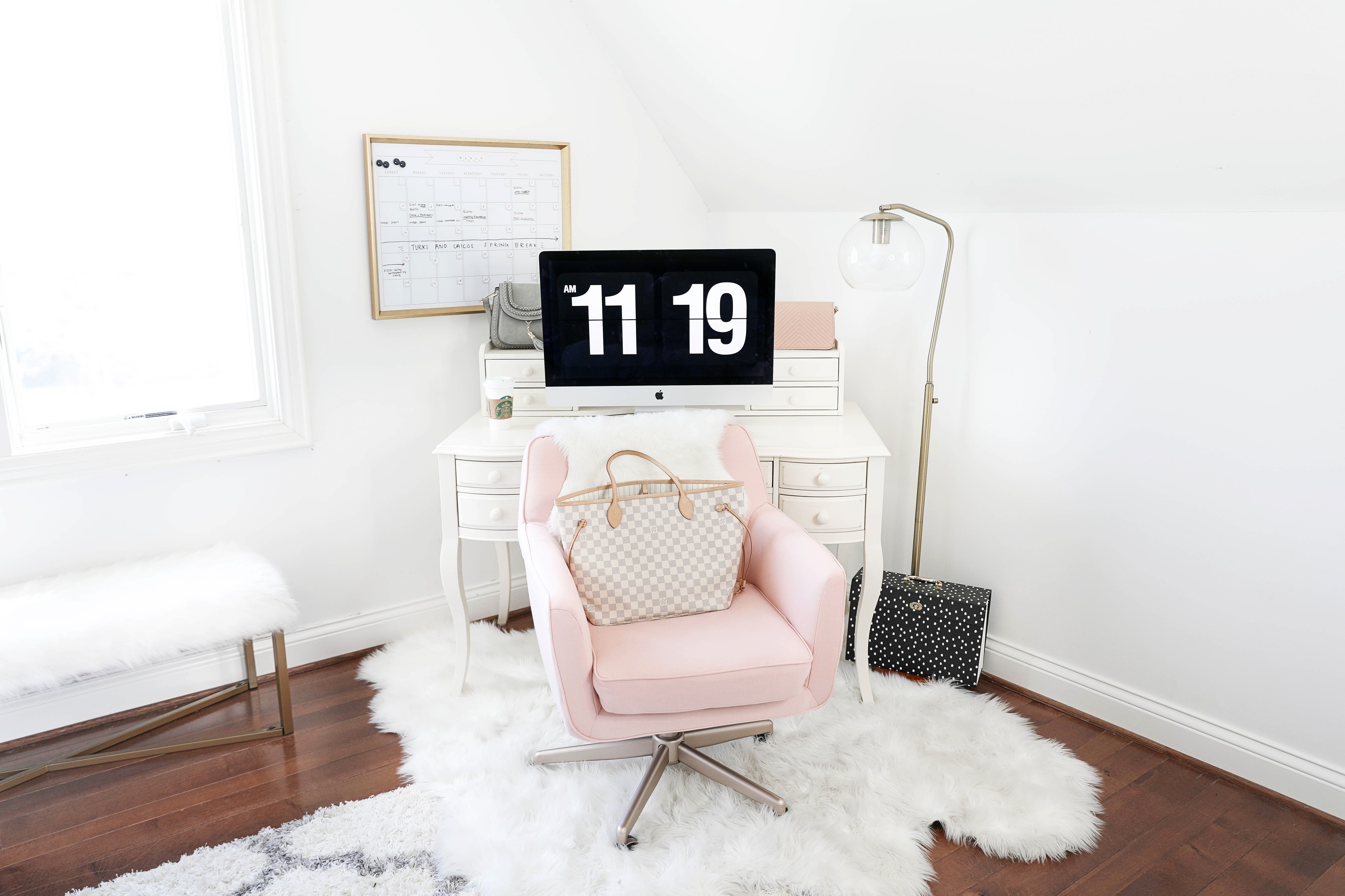Office tour! Ultimate desk goals for the girl boss! I love this super comfy pink desk chair! I had been looking for a new chair and found the perfect one! The space looks so cute with my faux sheep fuzzy rug, and all the white, black, gold and pink. This is also the cutest gold dry erase calendar! Details on fashion and lifestyle blog daily dose of charm by lauren lindmark