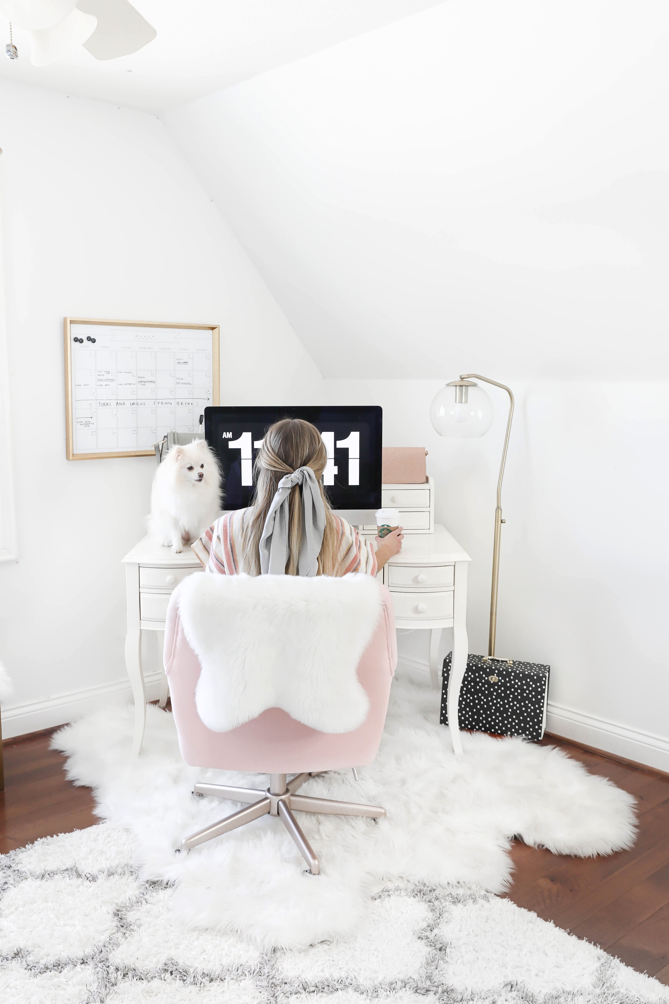 Office tour! Ultimate desk goals for the girl boss! I love this super comfy pink desk chair! I had been looking for a new chair and found the perfect one! The space looks so cute with my faux sheep fuzzy rug, and all the white, black, gold and pink. This is also the cutest gold dry erase calendar! Details on fashion and lifestyle blog daily dose of charm by lauren lindmark