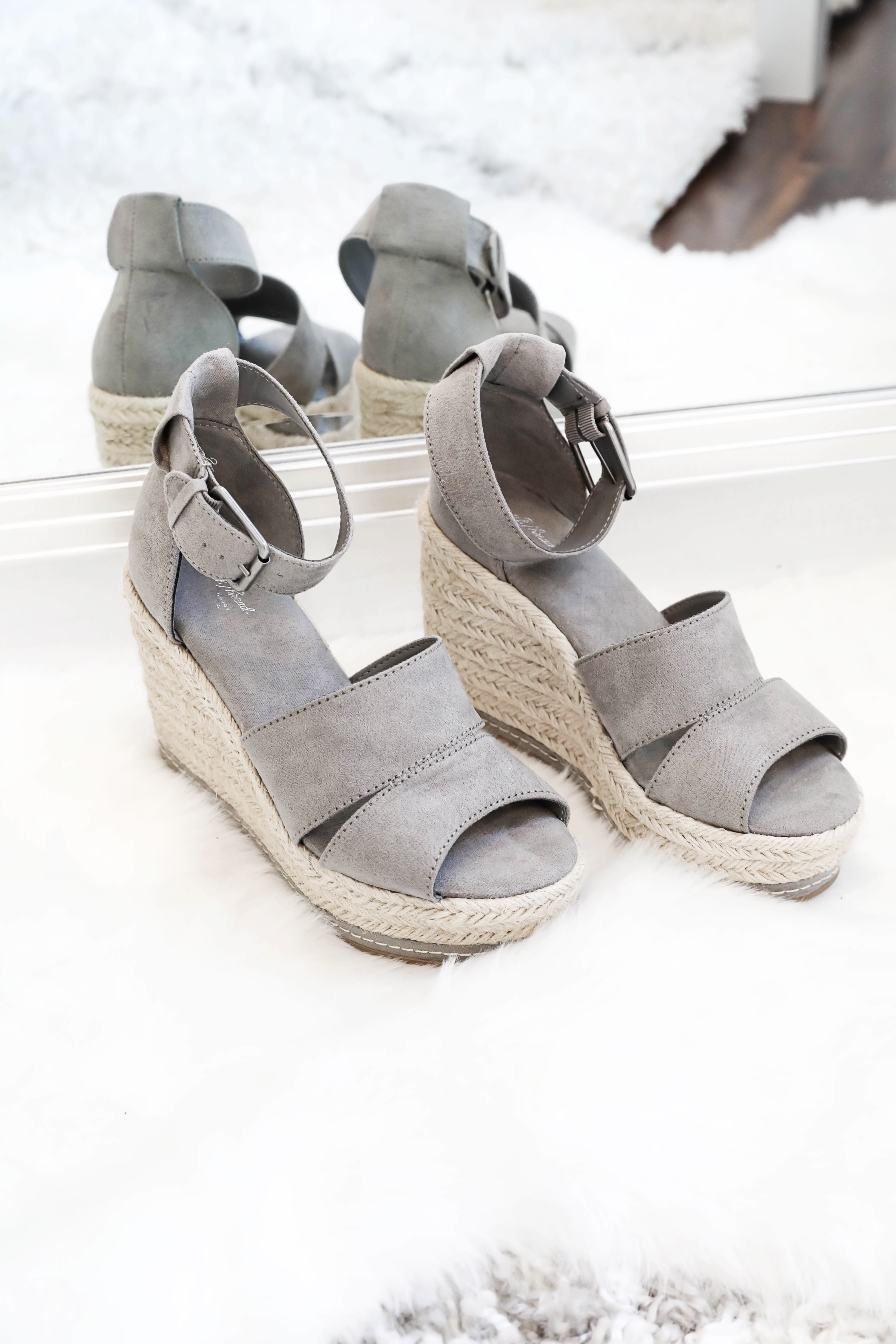 Spring shoe roundup 2019! All the cutest sandals, leopard heels, wedges, sneakers and more! All from target and Nordstrom! The cutest boutique photo Inso on white rugs! Details on fashion blog daily dose of charm by lauren lindmark