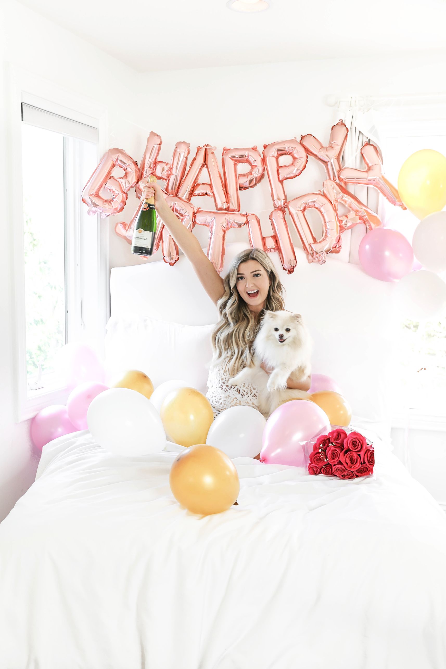 Happy birthday balloons photoshoot in bed with happy birthday blow ups and champagne! Details on fashion blog daily dose of charm by lauren lindmark