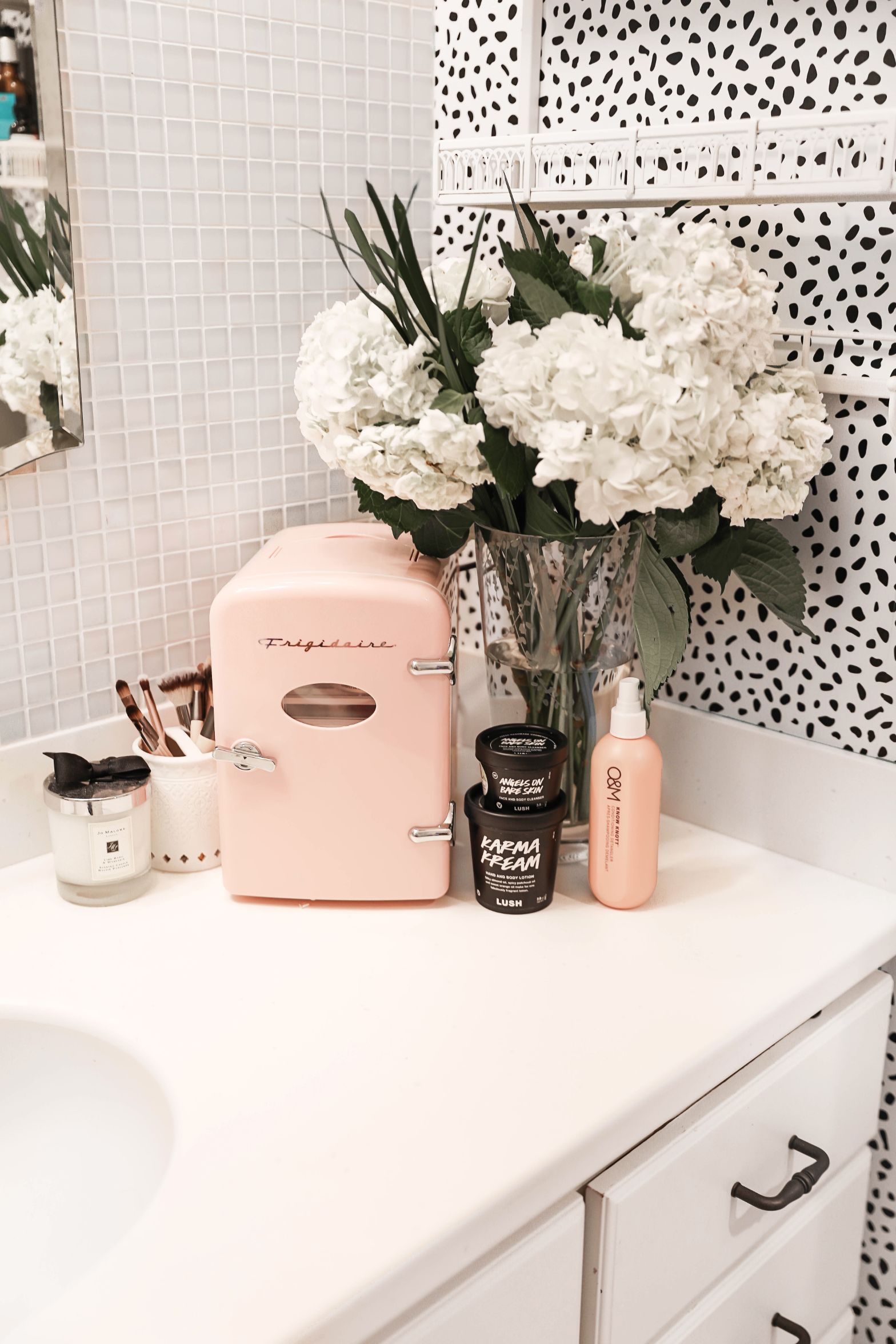 Beauty favorites spring 2019! I love my frigidaire mini retro beauty fridge! I stocked it with amazing face mask and lush products! Details on beauty and fashion blog daily dose of charm by lauren lindmark