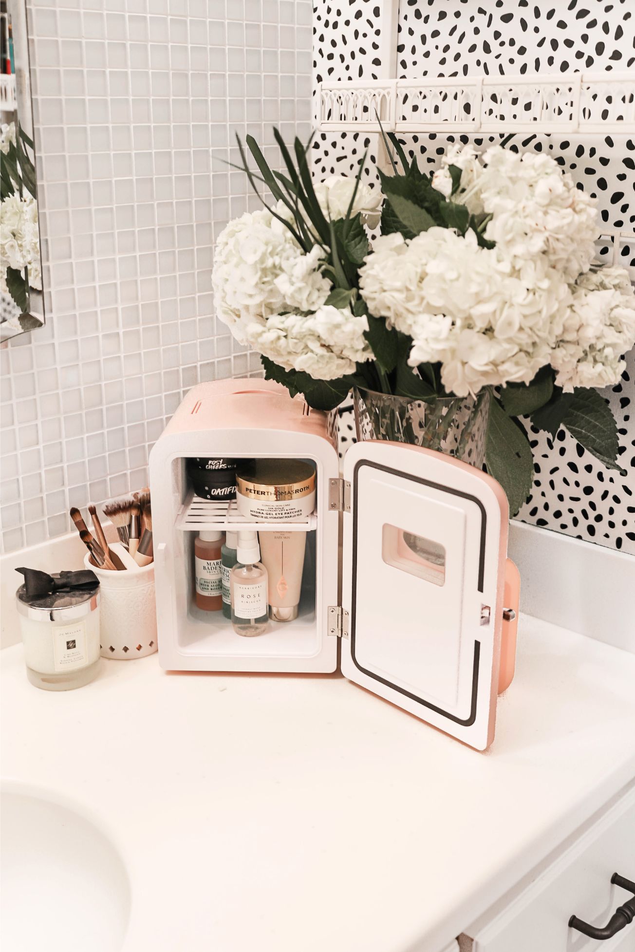 Beauty favorites spring 2019! I love my frigidaire mini retro beauty fridge! I stocked it with amazing face mask and lush products! Details on beauty and fashion blog daily dose of charm by lauren lindmark