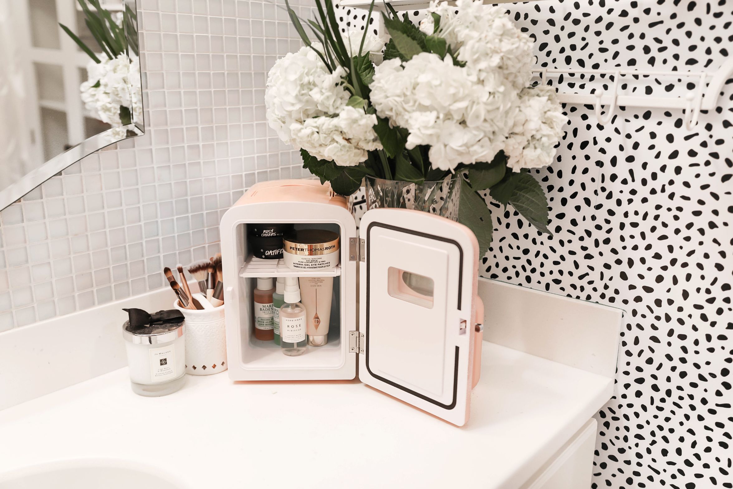 Beauty favorites spring 2019! I love my frigidaire mini retro beauty fridge! I stocked it with amazing face mask and lush products! Details on beauty and fashion blog daily dose of charm by lauren lindmark