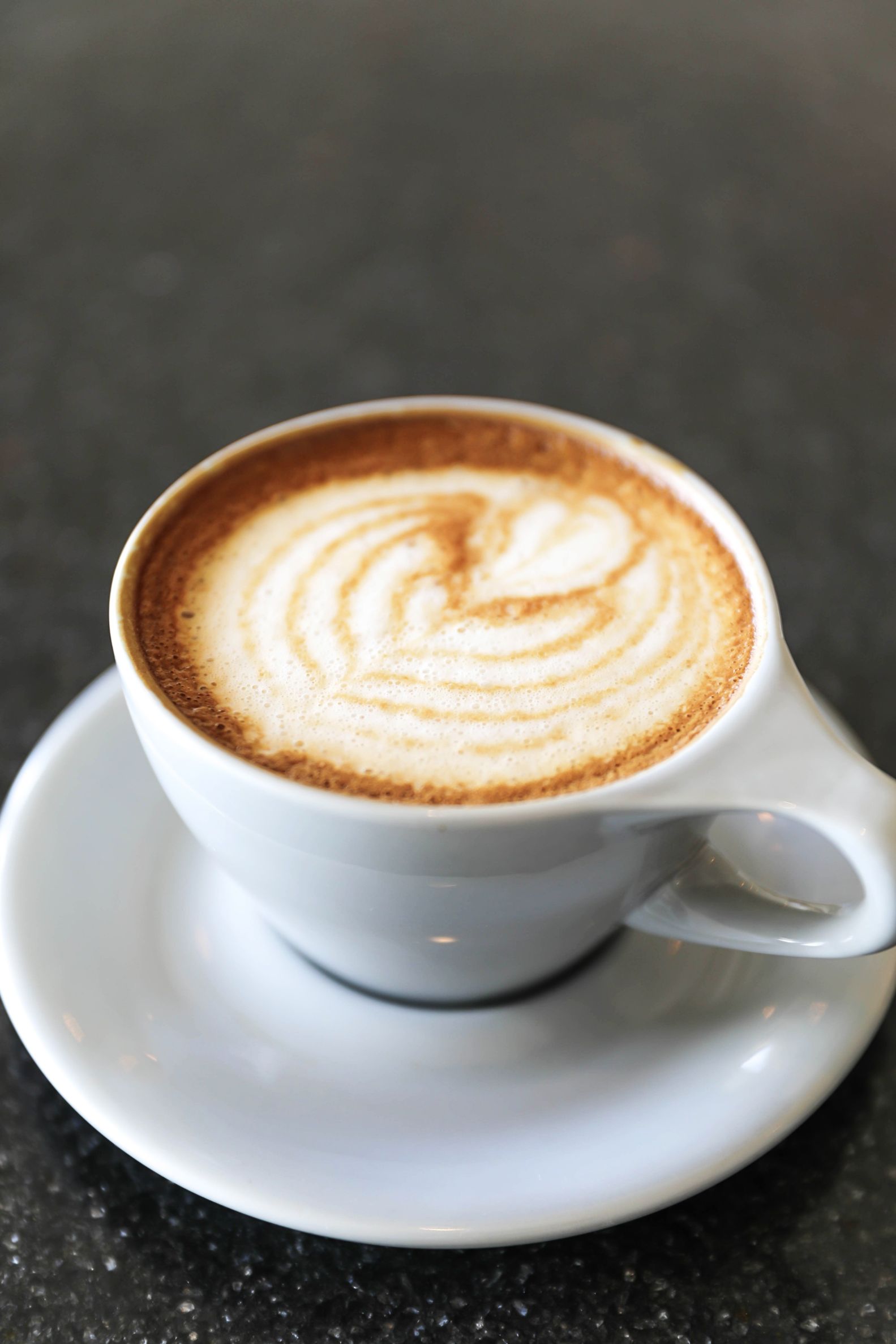 Best Kansas City Coffee shops! Cute restaurant photoshoot wearing an off the shoulder sweater! Details on fashion blog daily dose of charm by lauren lindmark